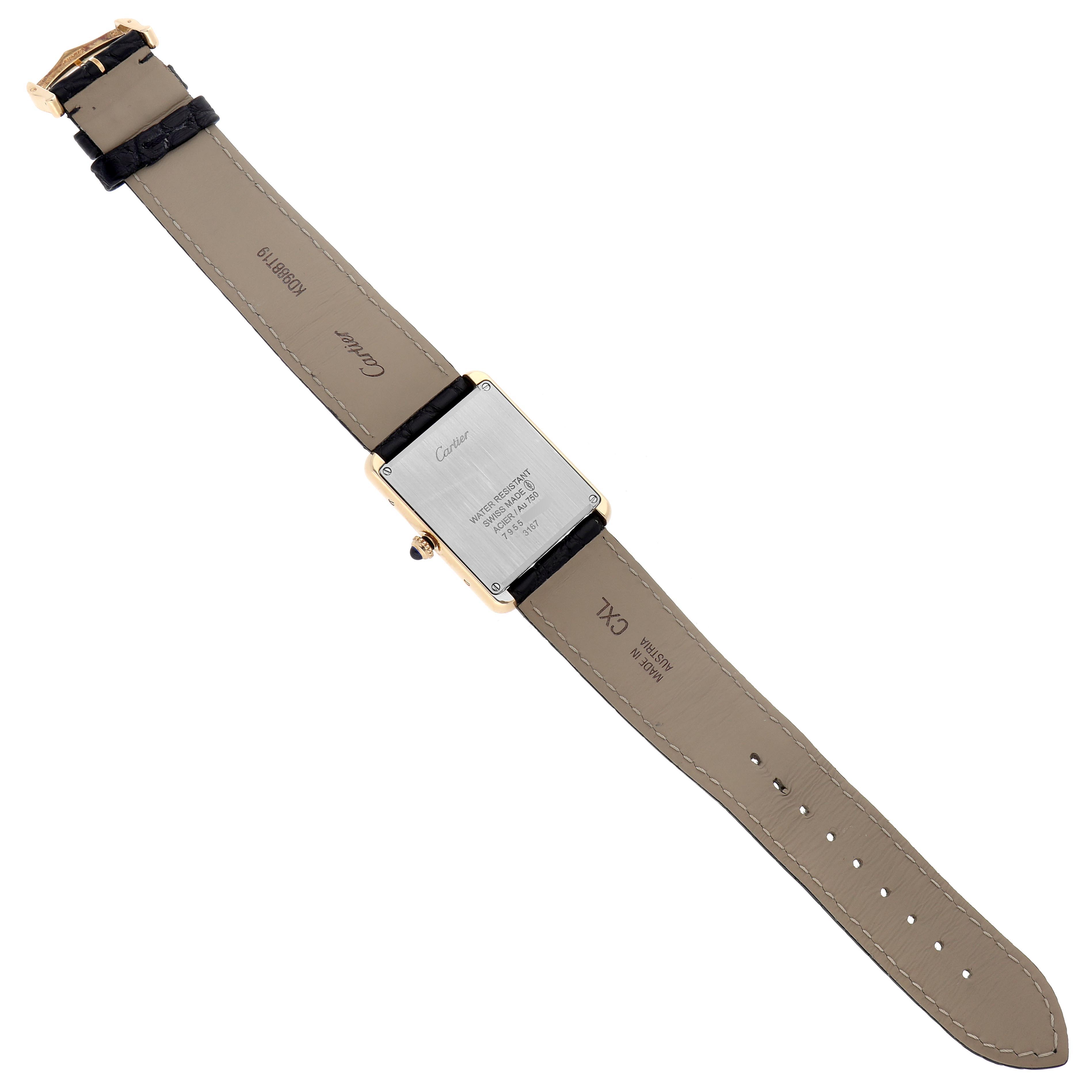 The image shows the back case and strap of a Cartier Tank Solo W5200004 Men's Steel and Gold (two tone) Silver Dial W5200004 Men's Steel and Gold (two tone) Silver Dial watch from a top-down angle.