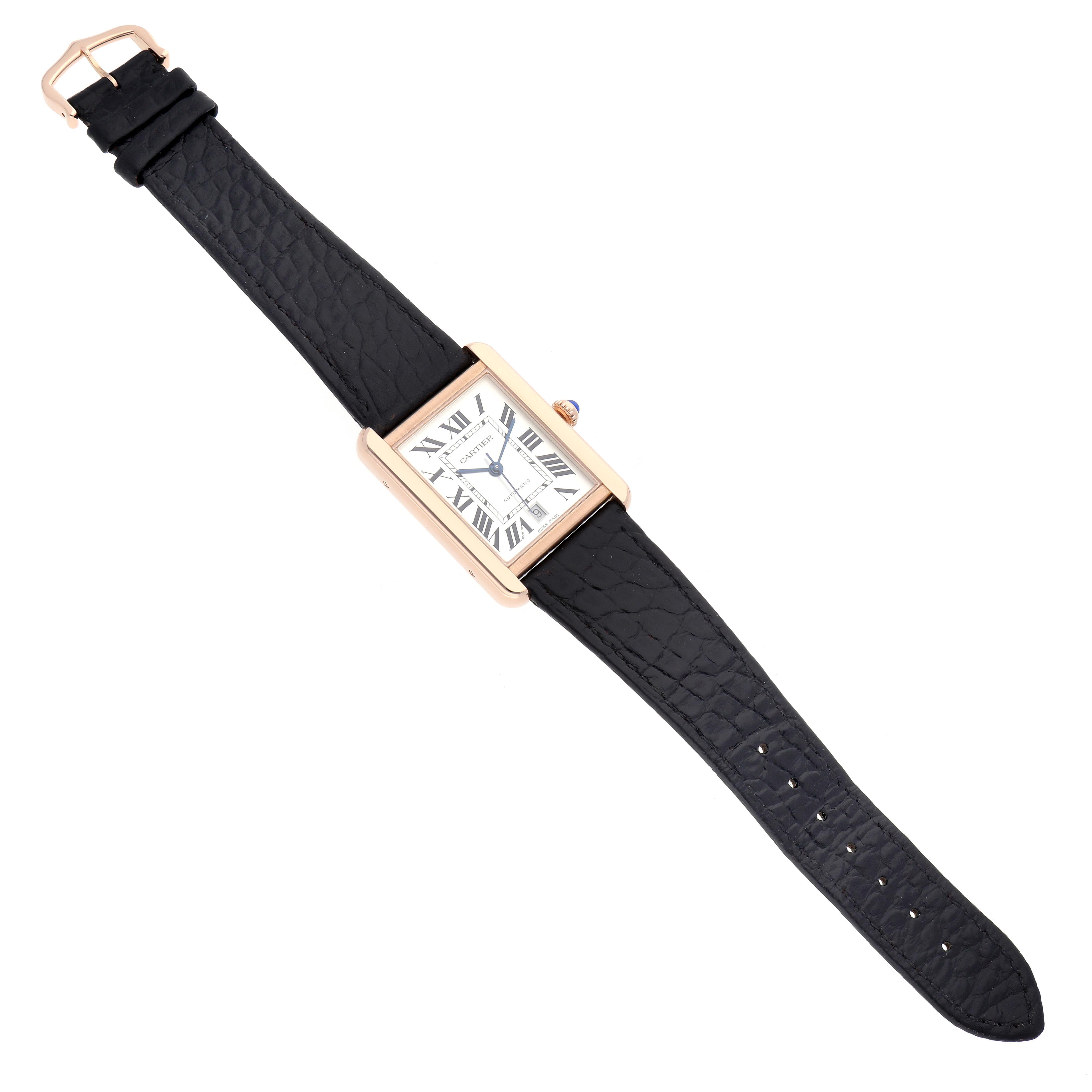 The Cartier Tank Solo W5200026 Men's Steel and Gold (two tone) Silver Dial W5200026 Men's Steel and Gold (two tone) Silver Dial watch is shown from a top-down angle, displaying its rectangular face and a black leather strap.