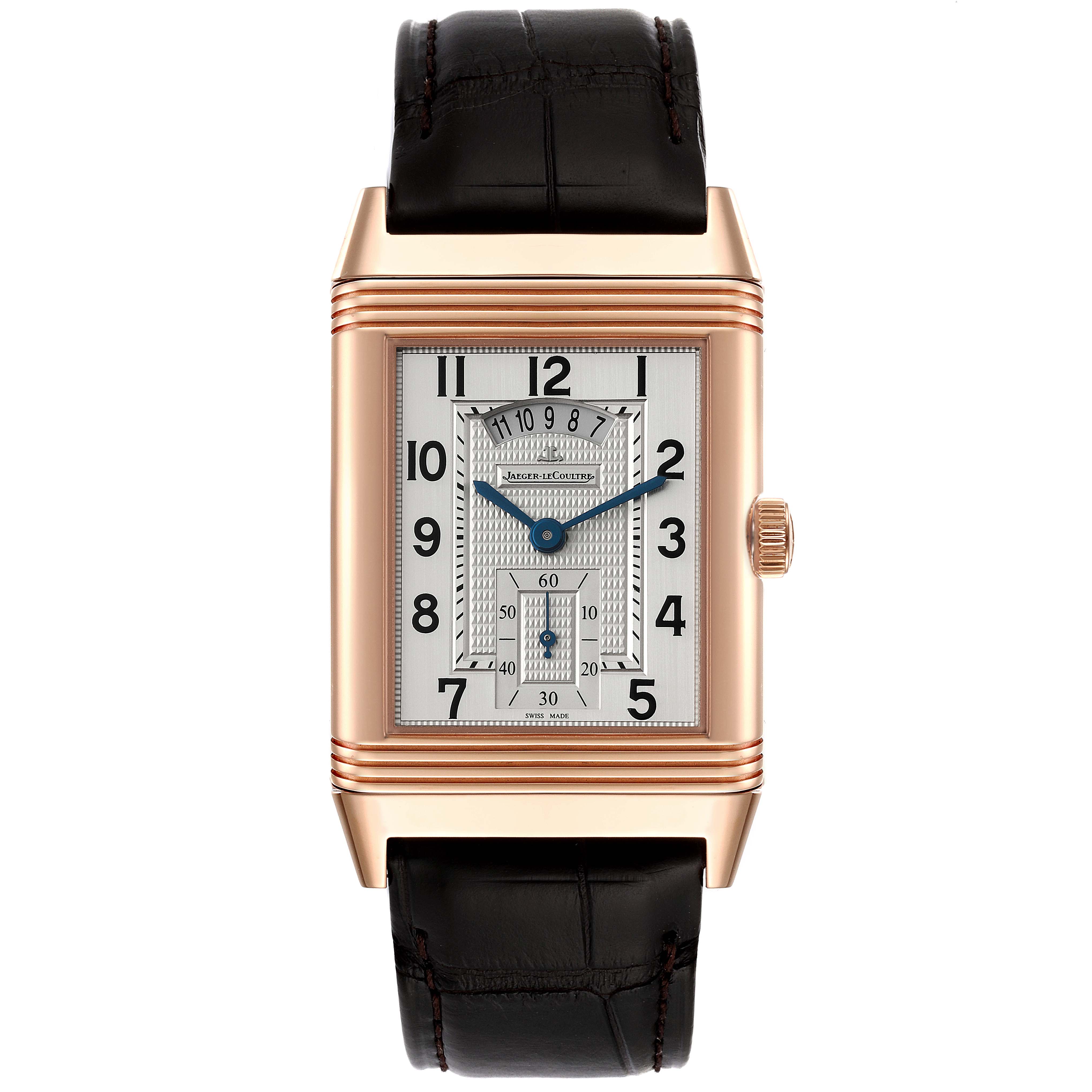 The image shows a front view of a Jaeger LeCoultre Reverso Q3742521 Men
s Rose Gold Silver Dial Q3742521 Men
s Rose Gold Silver Dial watch with a rectangular gold case, white dial, and black leather strap.