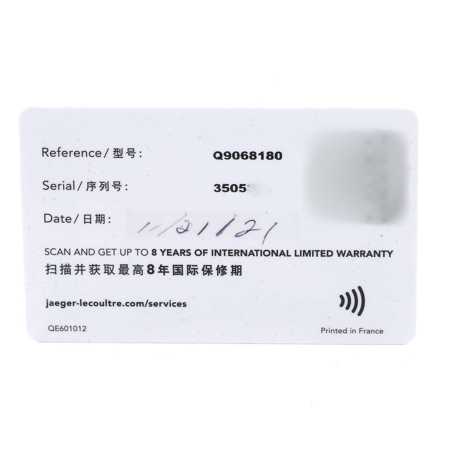 The image shows the warranty card with reference and serial numbers for the Jaeger LeCoultre Polaris Q9068180 Men's Stainless Steel Blue Dial Q9068180 Men's Stainless Steel Blue Dial model watch.