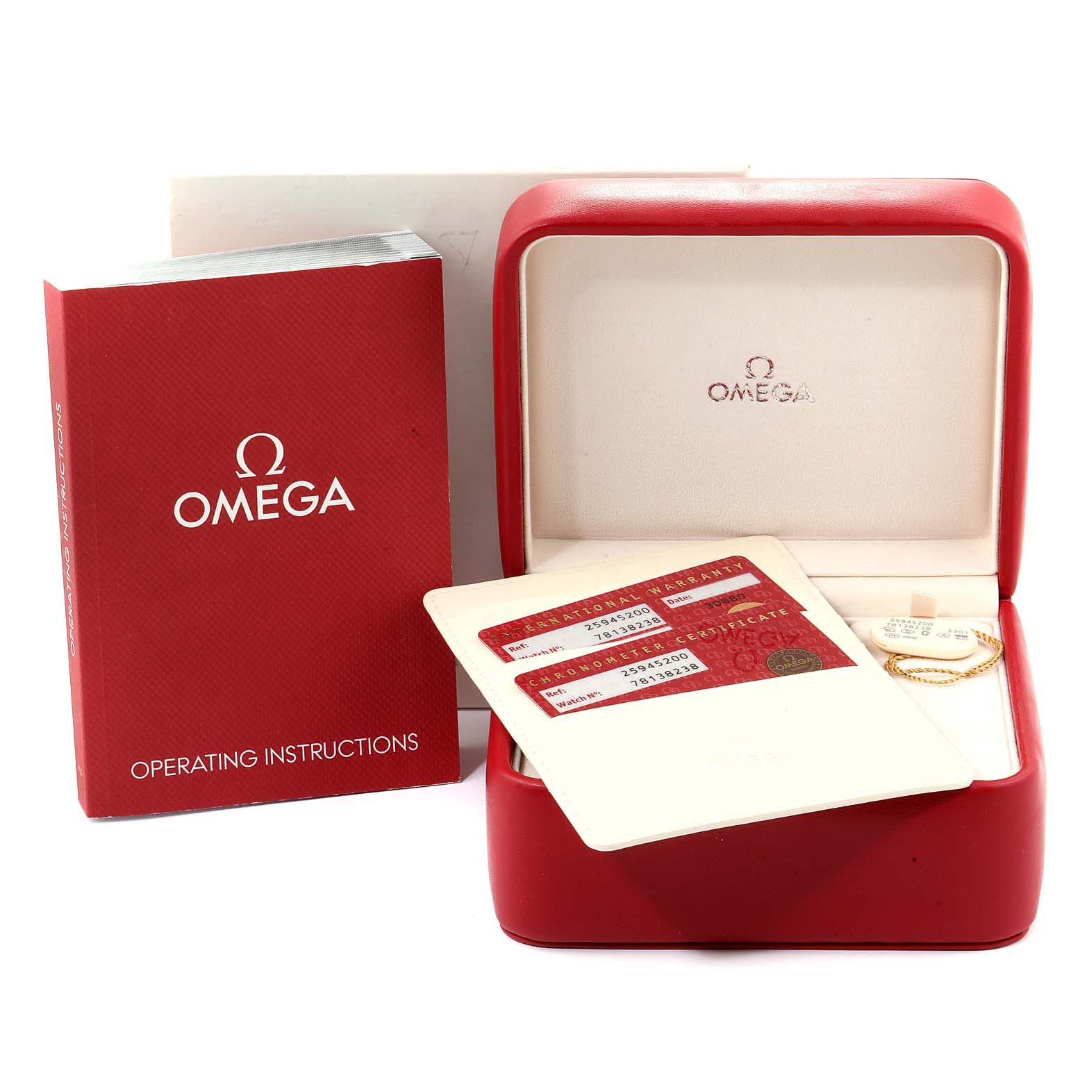 The image shows an Omega Seamaster 2594.52.00 Men
s Stainless Steel Black Dial 2594.52.00 Men
s Stainless Steel Black Dial watch box, warranty cards, and an operating instructions manual.