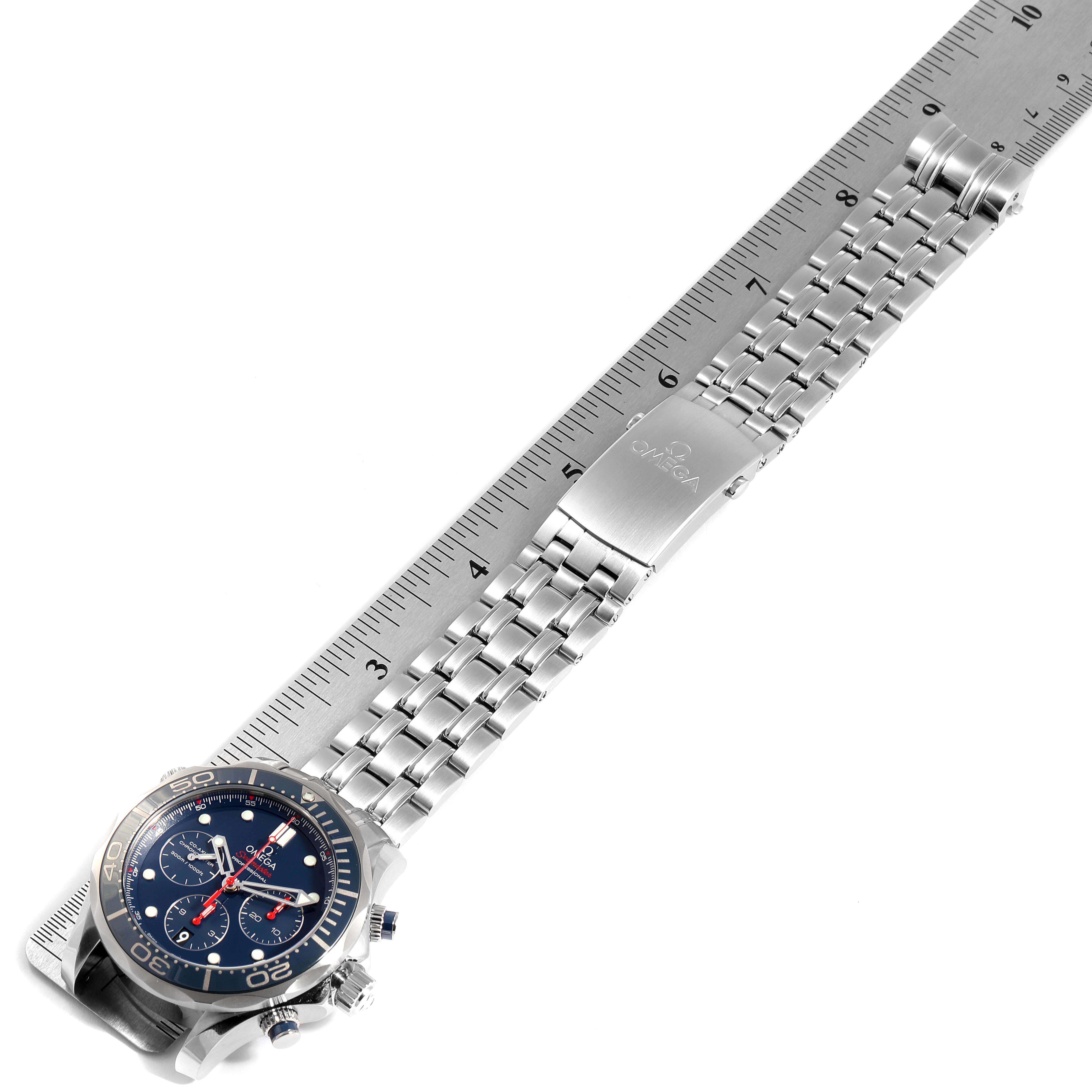 The image shows the Omega Seamaster 212.30.44.50.03.001 Men
s Stainless Steel Blue Dial 212.30.44.50.03.001 Men
s Stainless Steel Blue Dial watch laid flat with its bracelet extended and measured against a ruler.