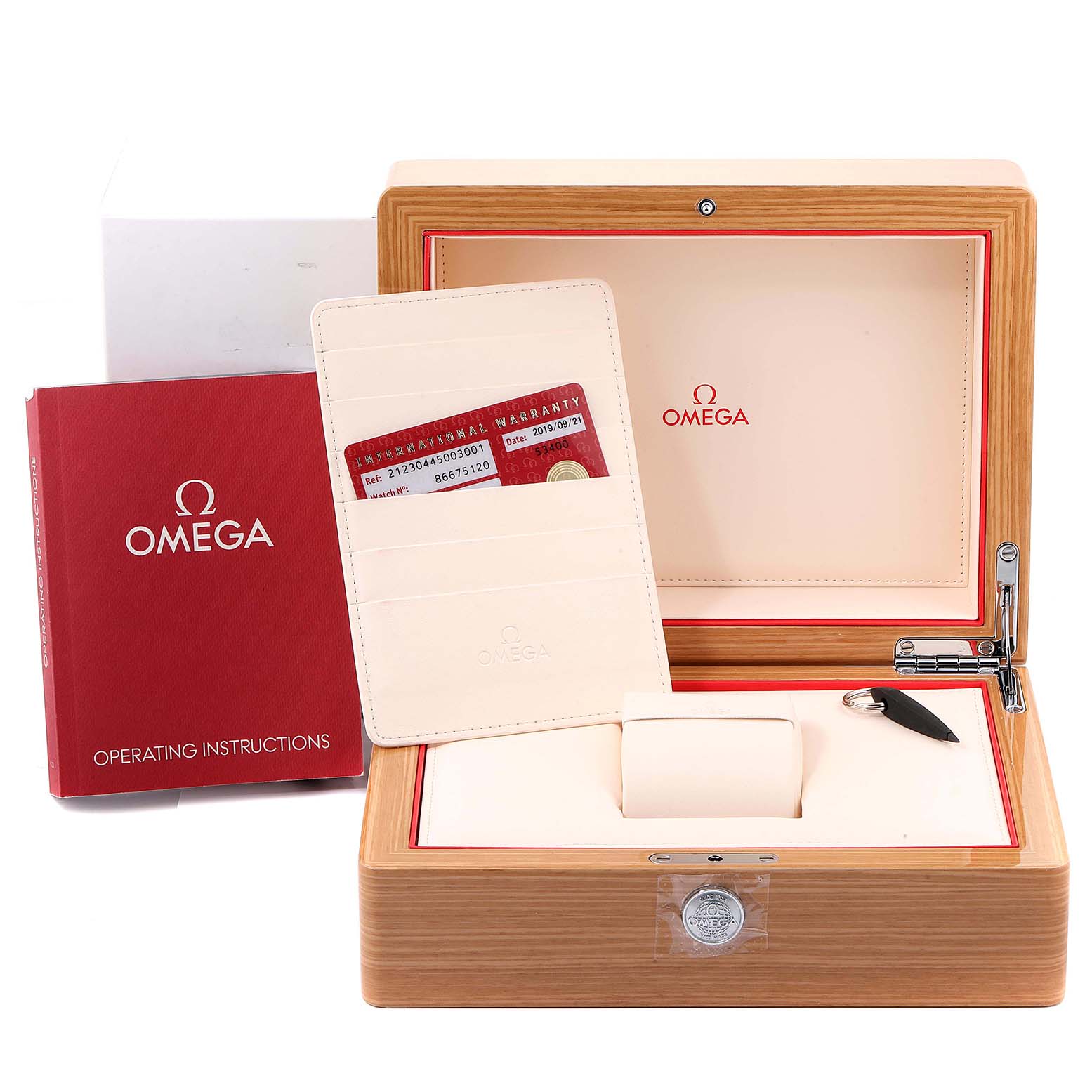 The image shows an Omega Seamaster 212.30.44.50.03.001 Men
s Stainless Steel Blue Dial 212.30.44.50.03.001 Men
s Stainless Steel Blue Dial watch
s packaging, including the wooden box, operating instructions, and warranty card.