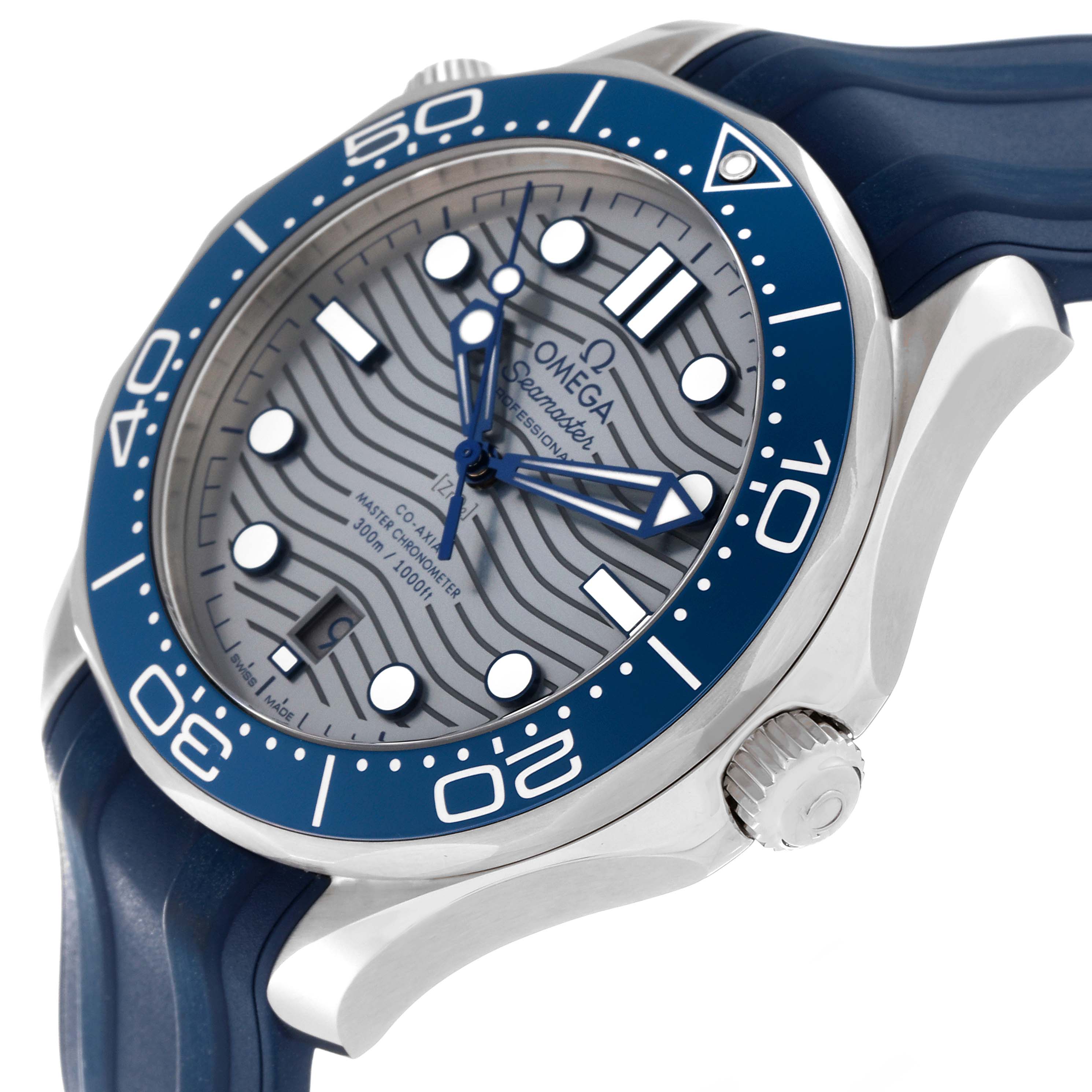 The image shows an angled view of the Omega Seamaster 210.32.42.20.06.001 Men's Stainless Steel Grey Dial 210.32.42.20.06.001 Men's Stainless Steel Grey Dial watch, highlighting the face, bezel, and crown along with the blue strap.