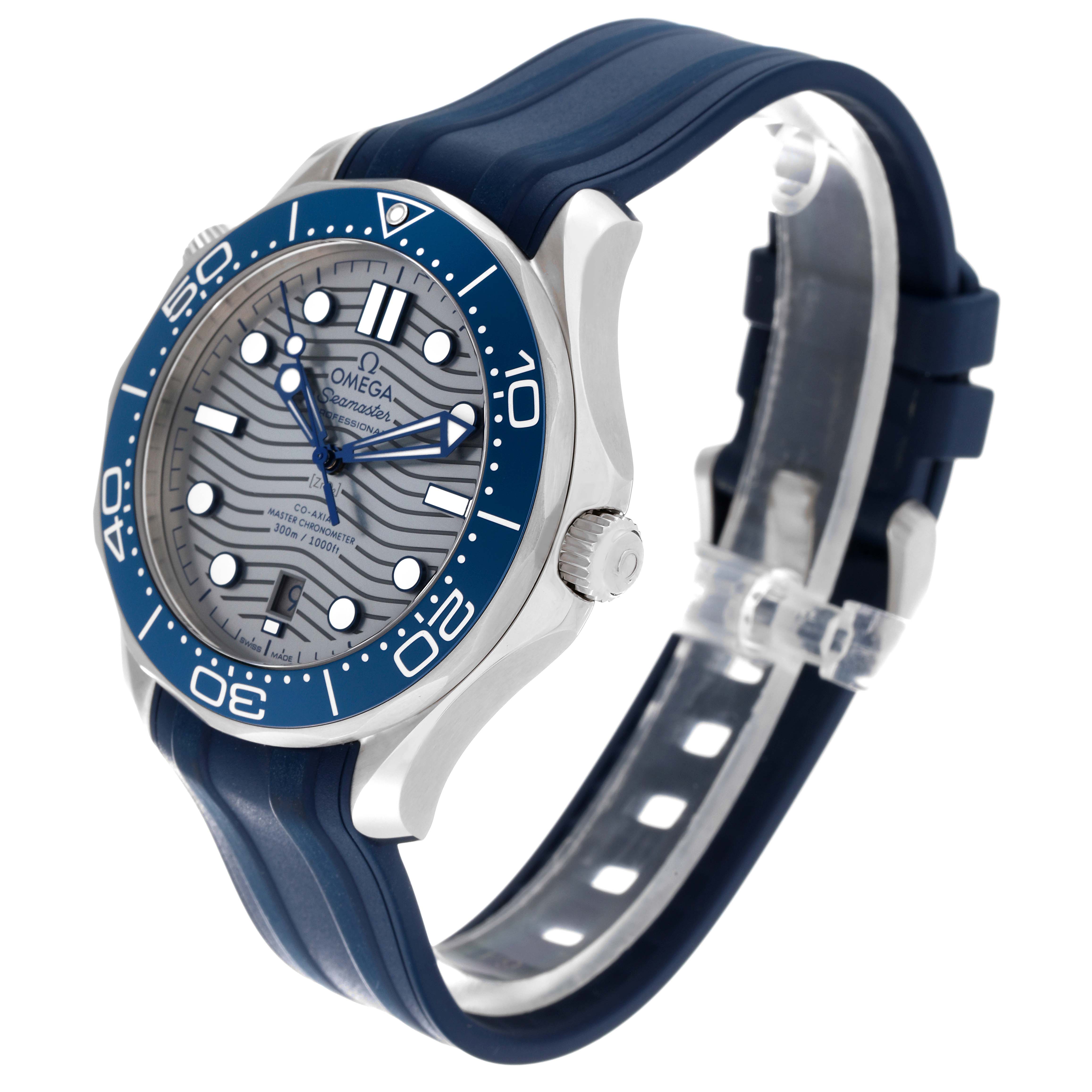 The image shows an Omega Seamaster 210.32.42.20.06.001 Men's Stainless Steel Grey Dial 210.32.42.20.06.001 Men's Stainless Steel Grey Dial watch at a three-quarter angle, highlighting its blue bezel, dial, and rubber strap.