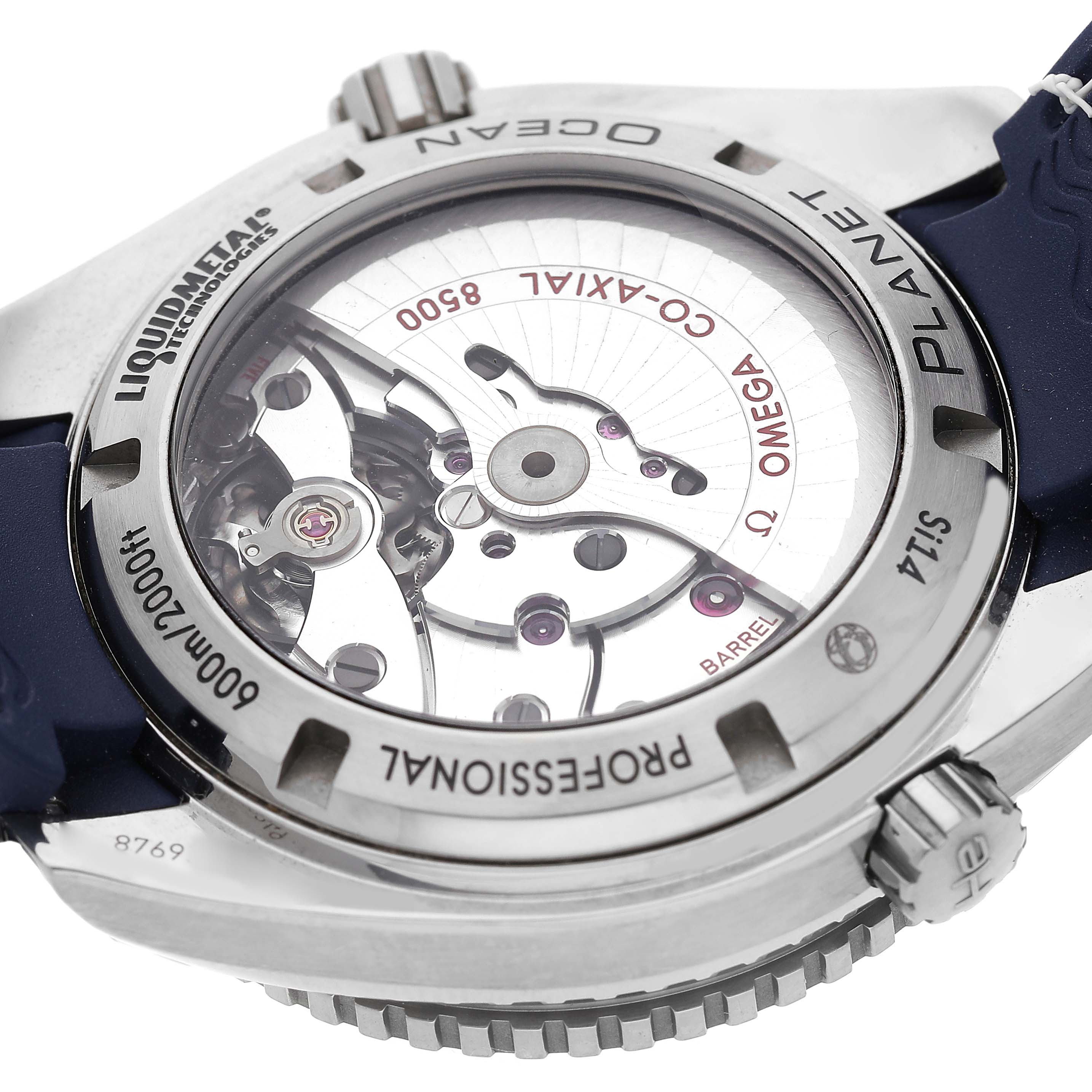 The Omega Planet Ocean 232.92.42.21.03.001 Men's Stainless Steel Blue Dial watch is shown from the back, highlighting its exposed mechanical movement and the case back details.