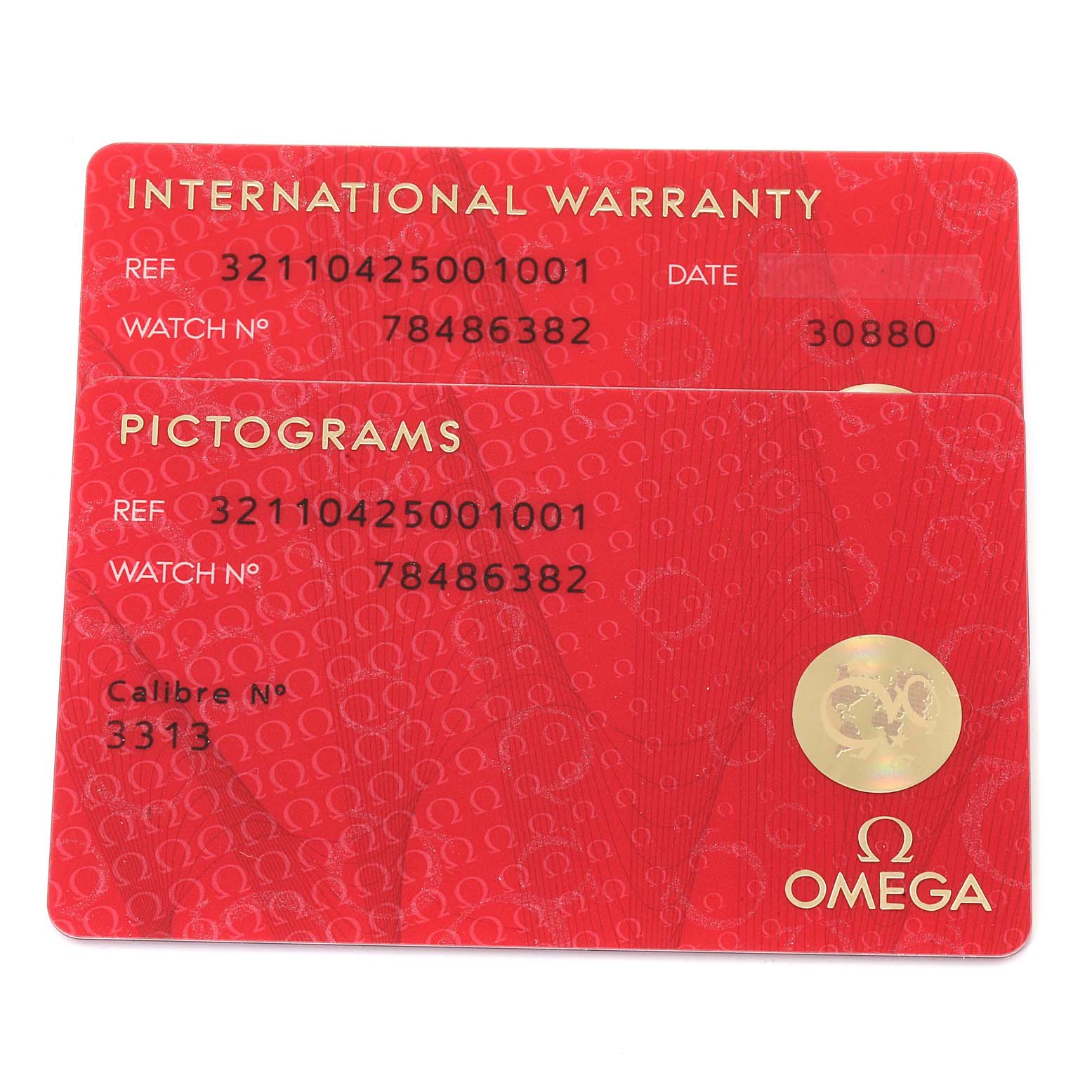 The image shows two red Omega Speedmaster 321.10.42.50.01.001 Men
s Stainless Steel Black Dial 321.10.42.50.01.001 Men
s Stainless Steel Black Dial cards: an International Warranty card and a Pictograms card.