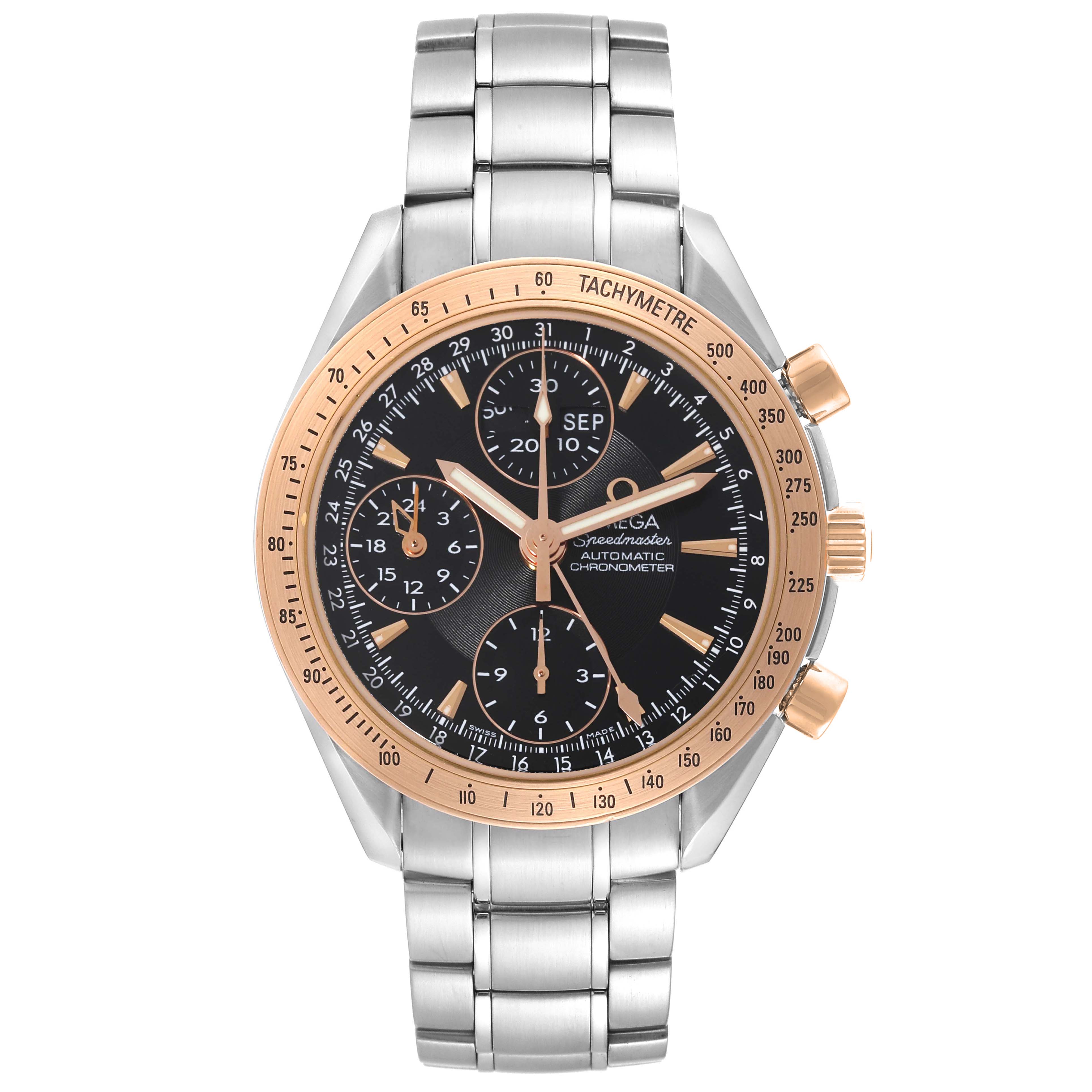This image shows a front view of an Omega Speedmaster 323.21.40.44.01.001 Men's Steel and Gold (two tone) Black Dial 323.21.40.44.01.001 Men's Steel and Gold (two tone) Black Dial watch, highlighting the dial, case, bezel, and stainless steel bracelet.
