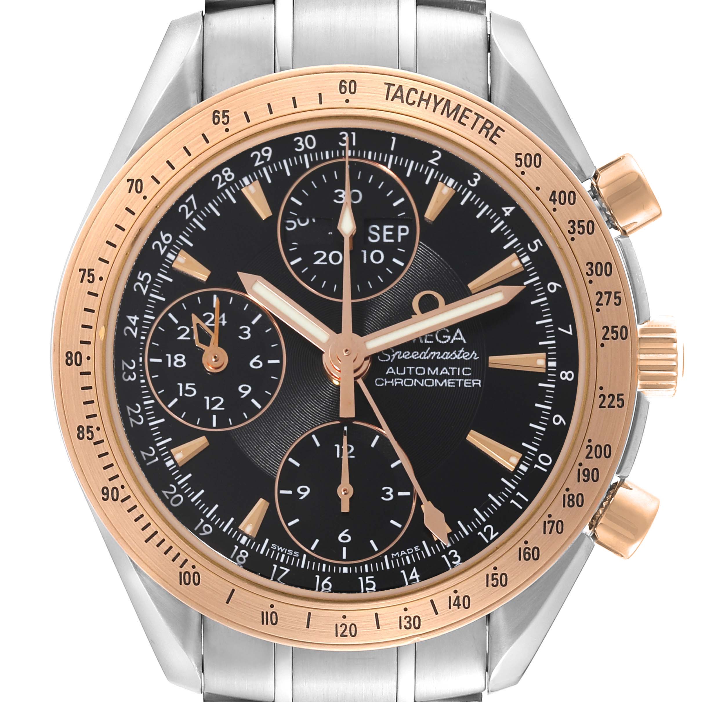 The Omega Speedmaster 323.21.40.44.01.001 Men's Steel and Gold (two tone) Black Dial 323.21.40.44.01.001 Men's Steel and Gold (two tone) Black Dial watch is shown from a front angle displaying the dial, bezel, and pushers.