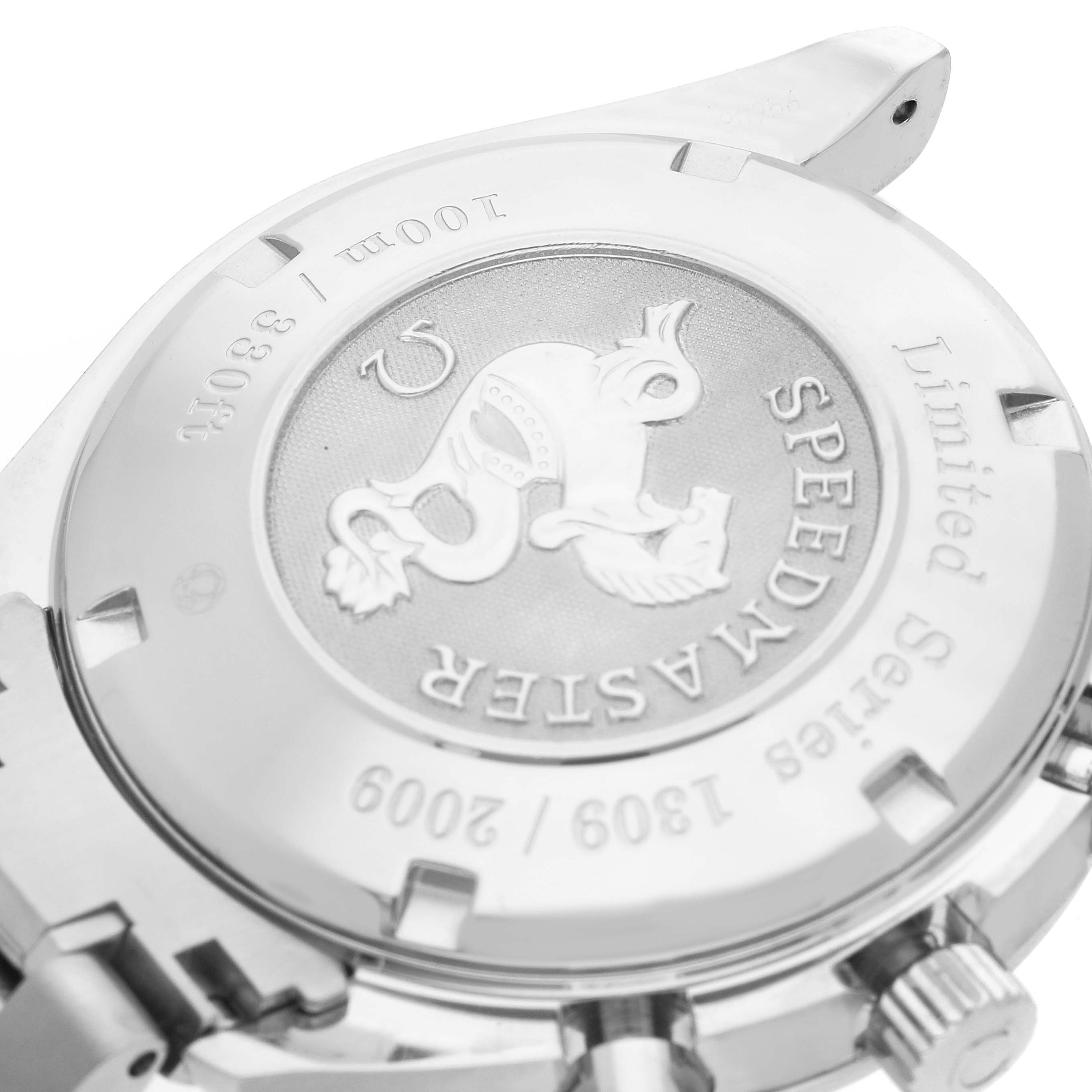 The image shows the back case of an Omega Speedmaster 323.30.40.40.02.001 Men
s Stainless Steel Silver Dial 323.30.40.40.02.001 Men
s Stainless Steel Silver Dial watch, highlighting its Limited Series engraving and logo.