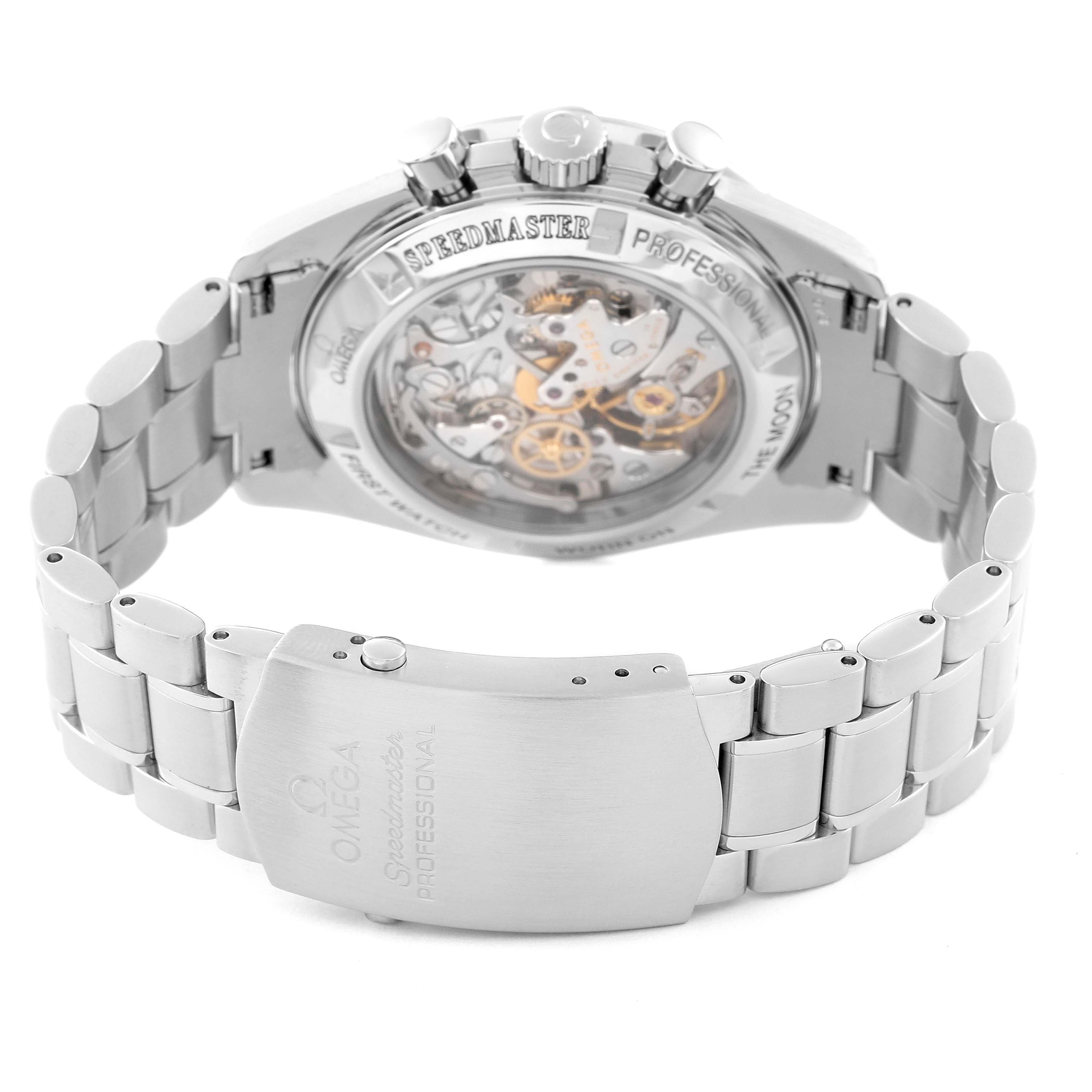 The image shows the back and clasp of the Omega Speedmaster 3572.50.00 Men
s Stainless Steel Black Dial 3572.50.00 Men
s Stainless Steel Black Dial watch, highlighting the mechanical movement and bracelet.