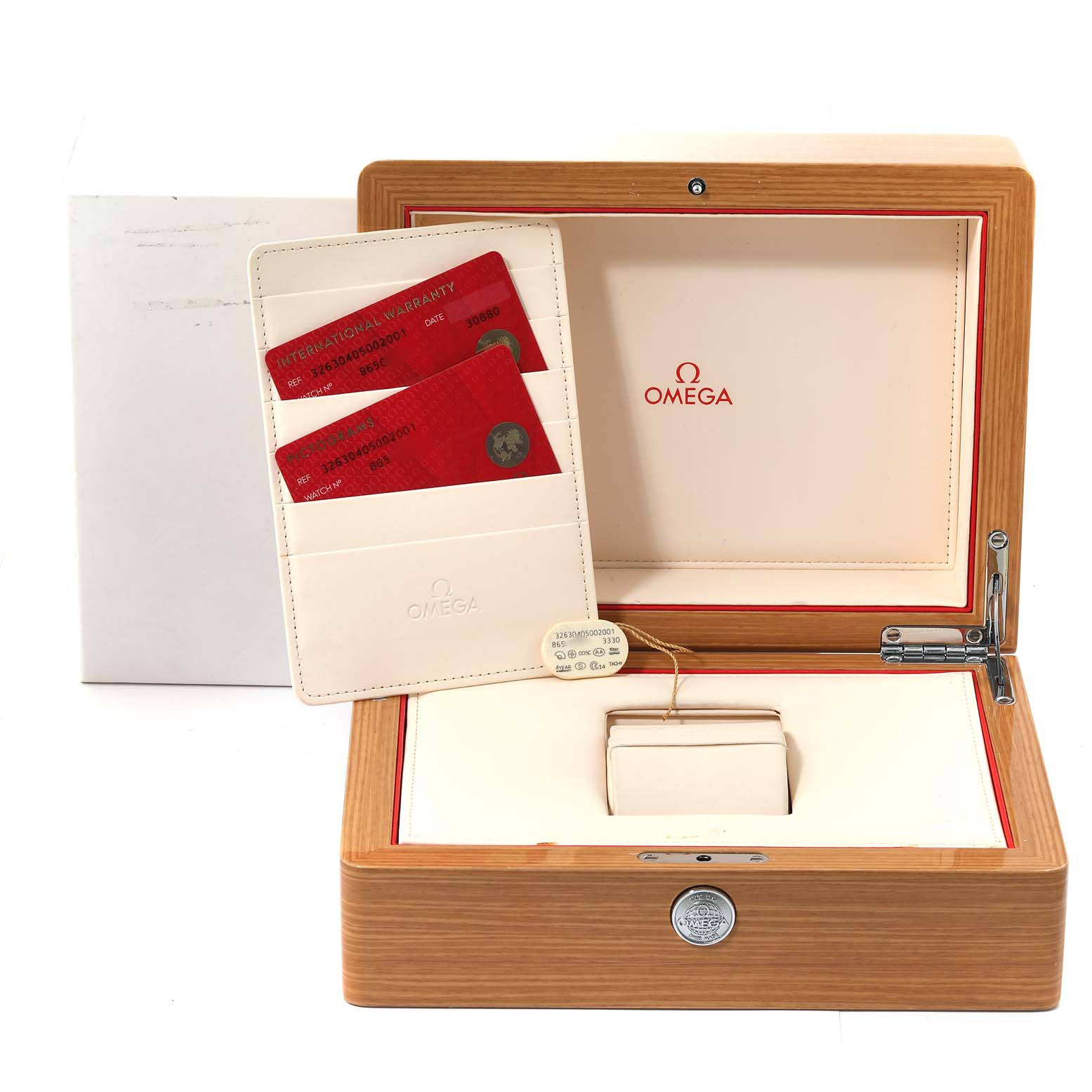 The image shows an open Omega Speedmaster 326.30.40.50.02.001 Men
s Stainless Steel Silver Dial 326.30.40.50.02.001 Men
s Stainless Steel Silver Dial watch box with warranty cards, card holder, and a tag inside.