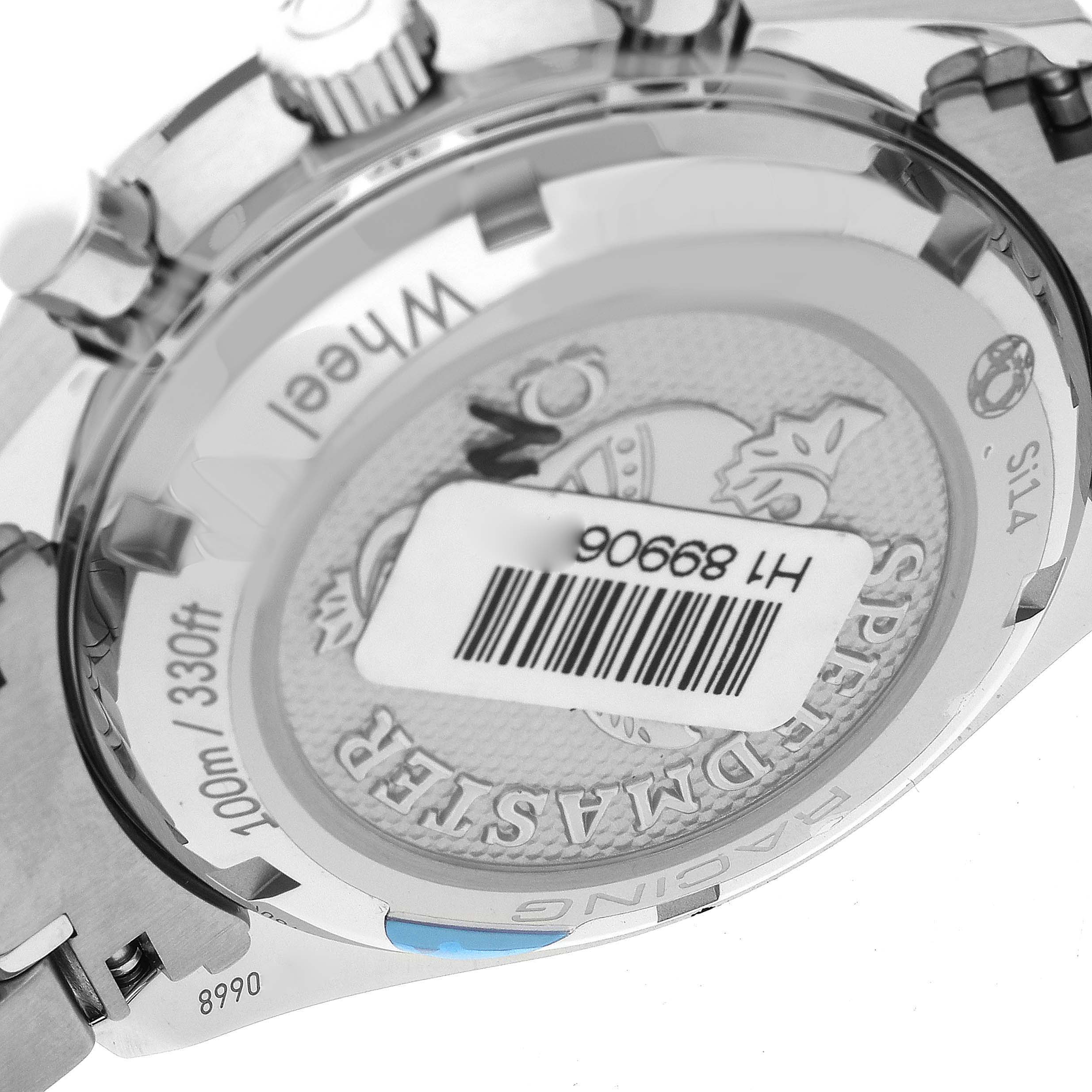 The image shows the back case of an Omega Speedmaster 326.30.40.50.01.002 Men
s Stainless Steel Black Dial 326.30.40.50.01.002 Men
s Stainless Steel Black Dial watch at an angled close-up.