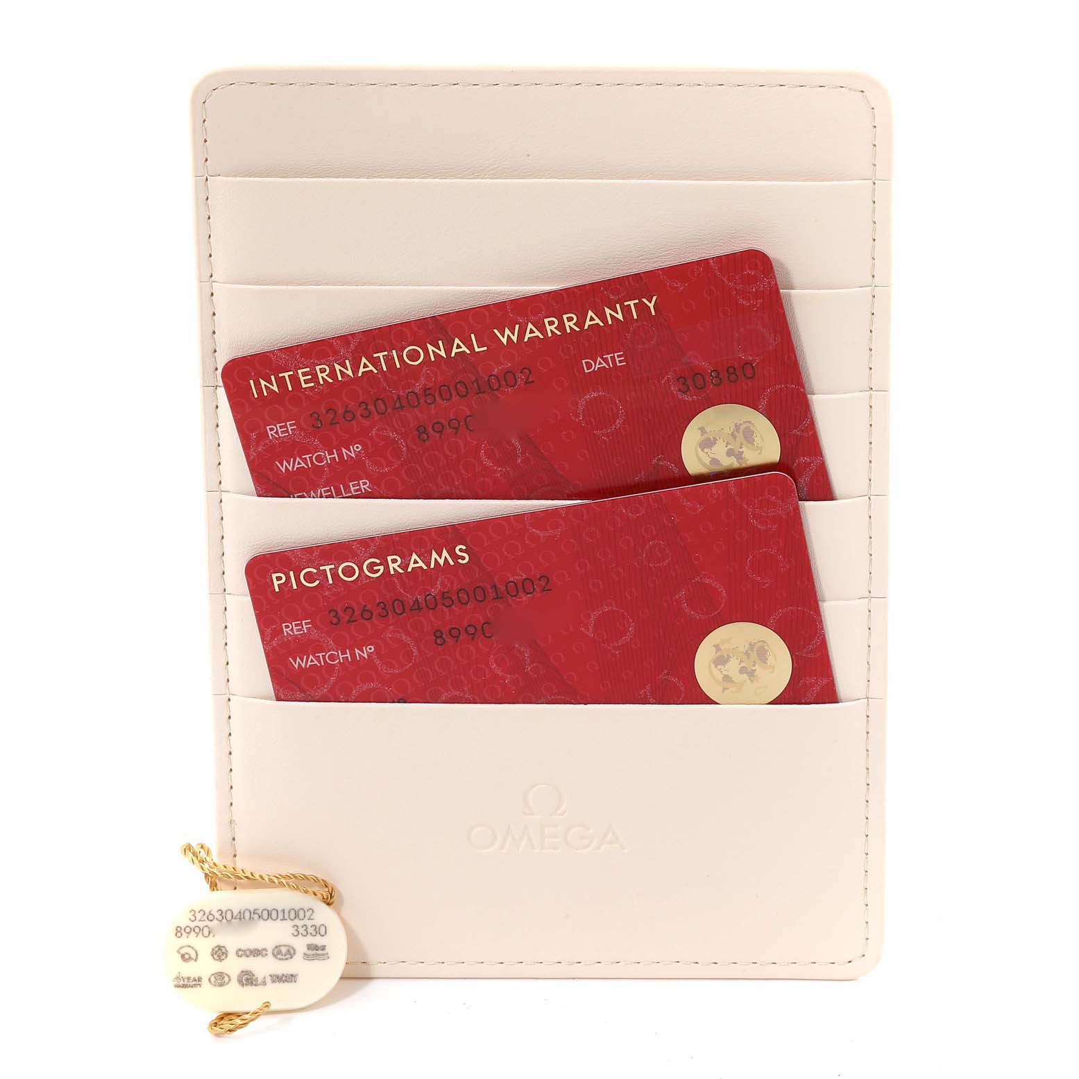 The image shows two red warranty cards and a white Omega tag for the Omega Speedmaster 326.30.40.50.01.002 Men
s Stainless Steel Black Dial 326.30.40.50.01.002 Men
s Stainless Steel Black Dial watch, placed in a white cardholder.