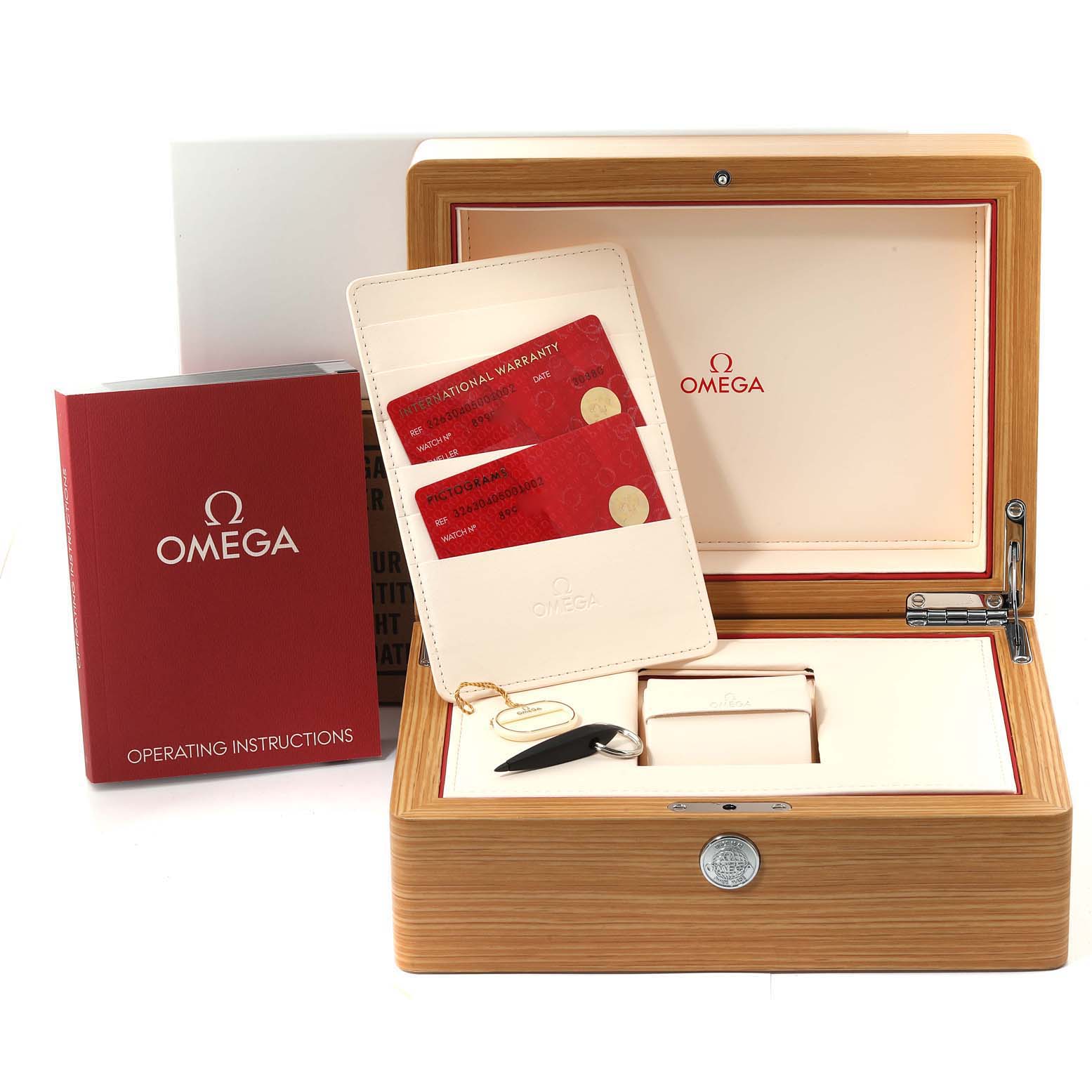 This image shows the Omega Speedmaster 326.30.40.50.01.002 Men
s Stainless Steel Black Dial 326.30.40.50.01.002 Men
s Stainless Steel Black Dial watch packaging, including the box, operating instructions, warranty cards, and accessories.