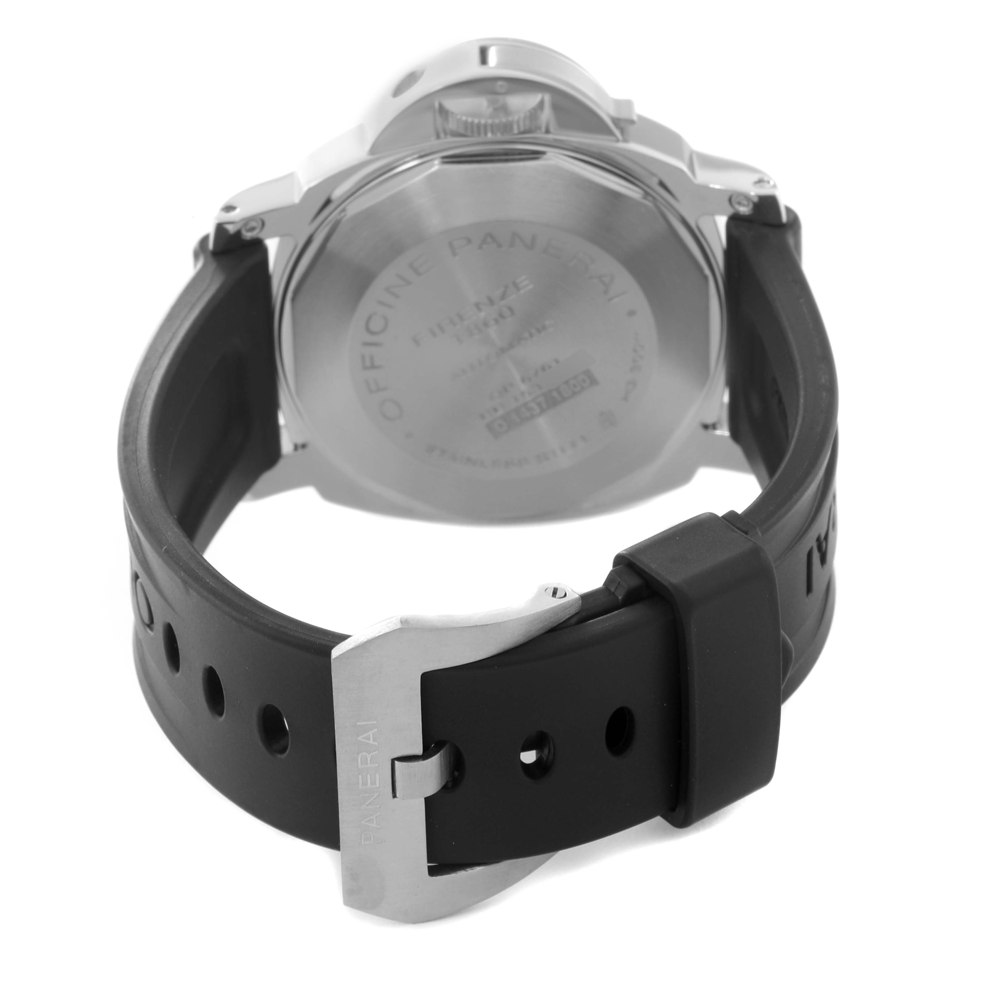The image shows the back view of a Luminor model by Panerai, highlighting its case back and rubber strap with a buckle.