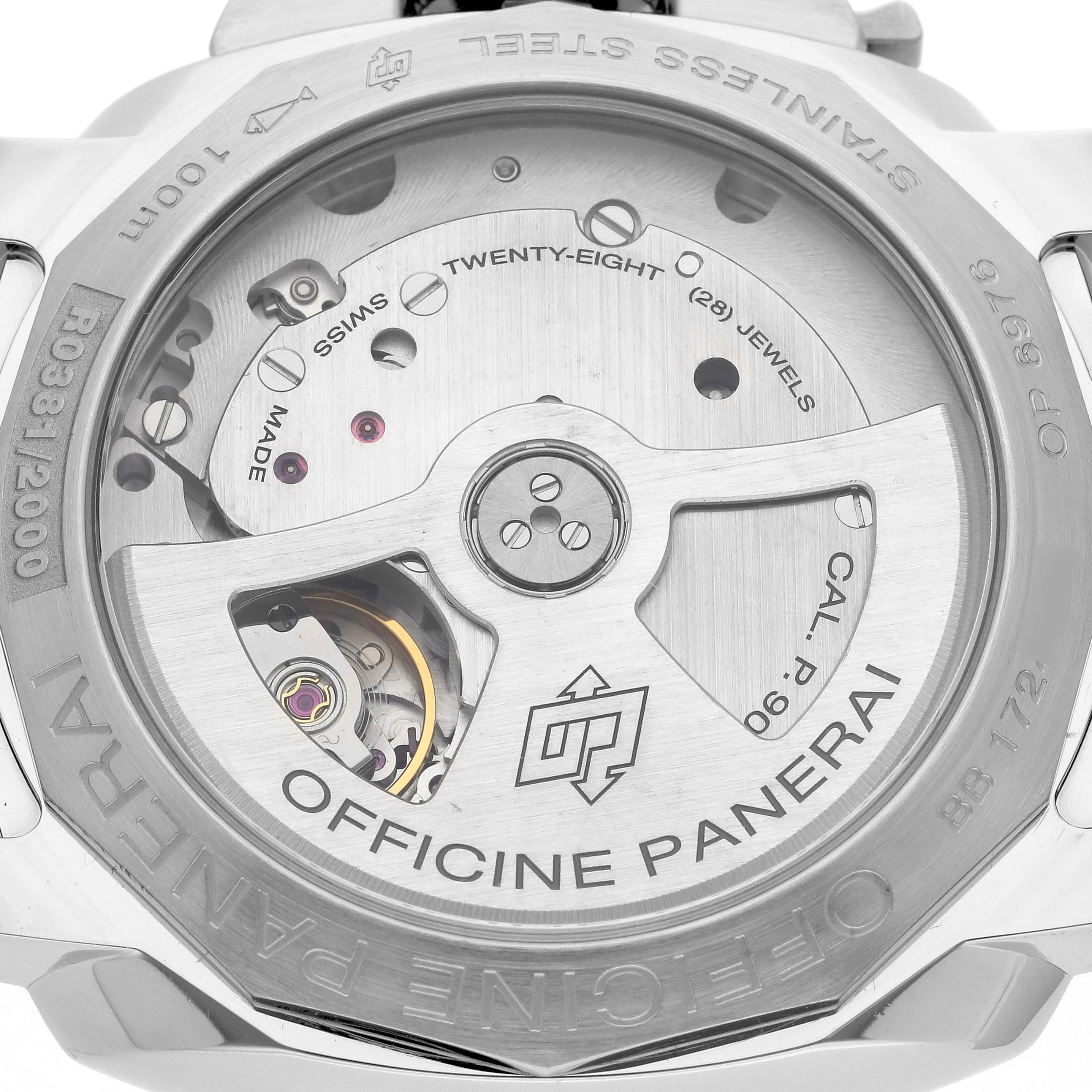 The image shows the back of a Panerai Luminor PAM00523 Men's Stainless Steel White Dial PAM00523 Men's Stainless Steel White Dial watch, highlighting its exposed movement and engraved markings.