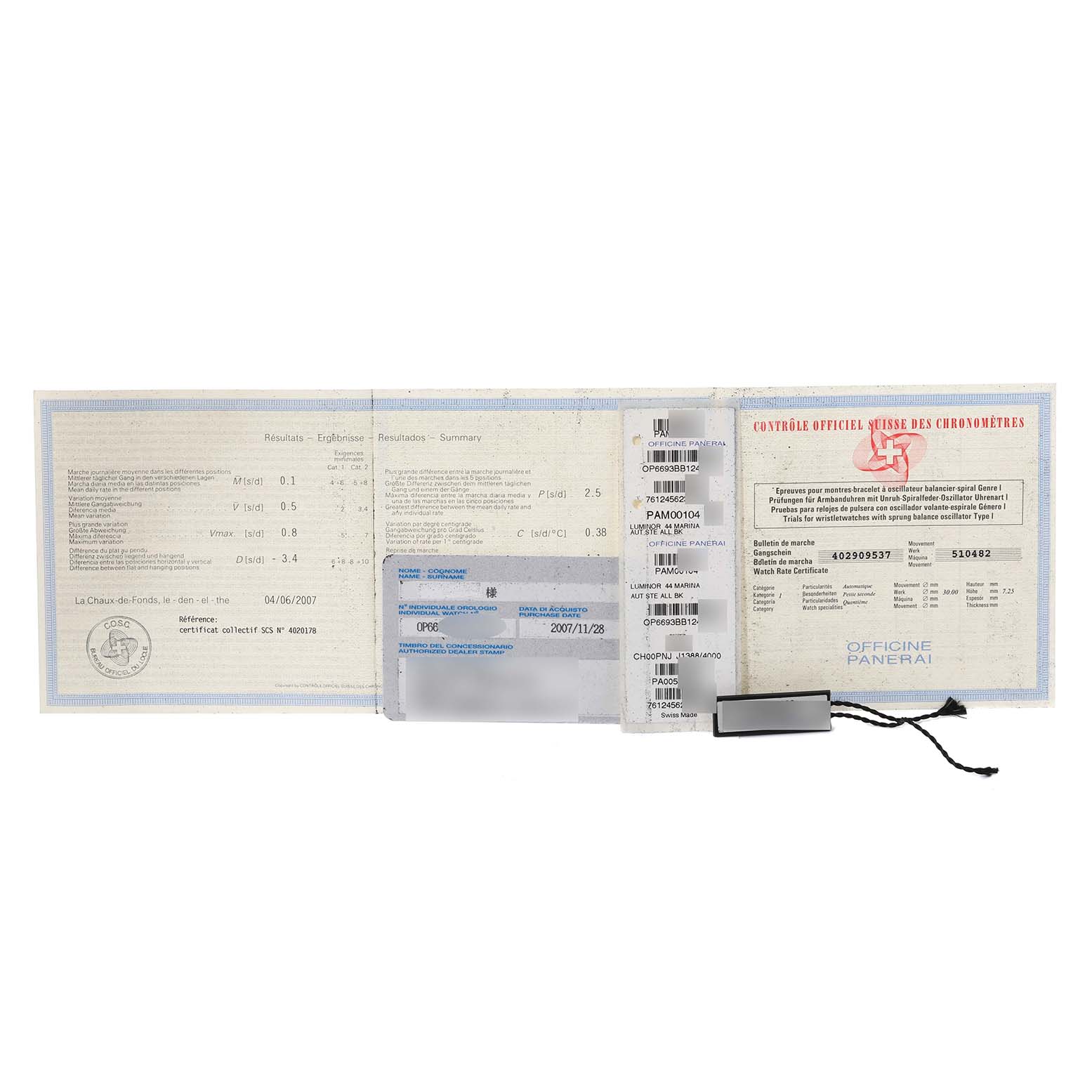 The image shows the warranty card, certification documents, and tags for a Panerai Luminor PAM00104 Men
s Stainless Steel Black Dial PAM00104 Men
s Stainless Steel Black Dial watch laid out flat.