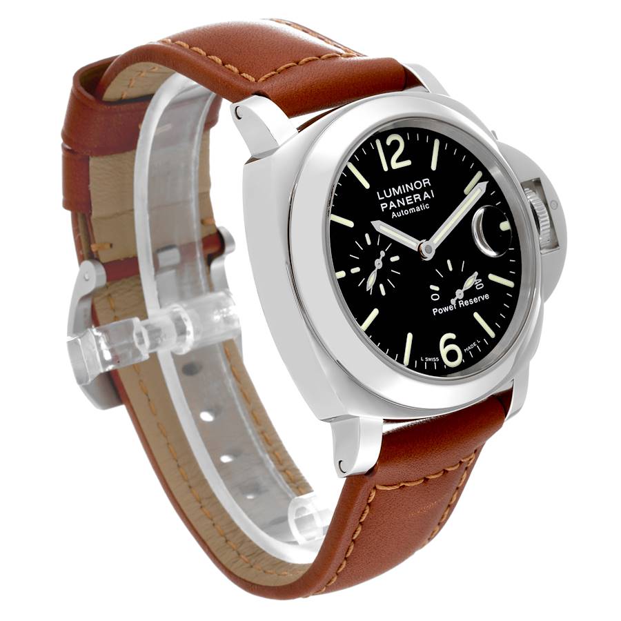 The image shows a Panerai Luminor watch at a three-quarter angle, highlighting the face, crown guard, and brown leather strap.