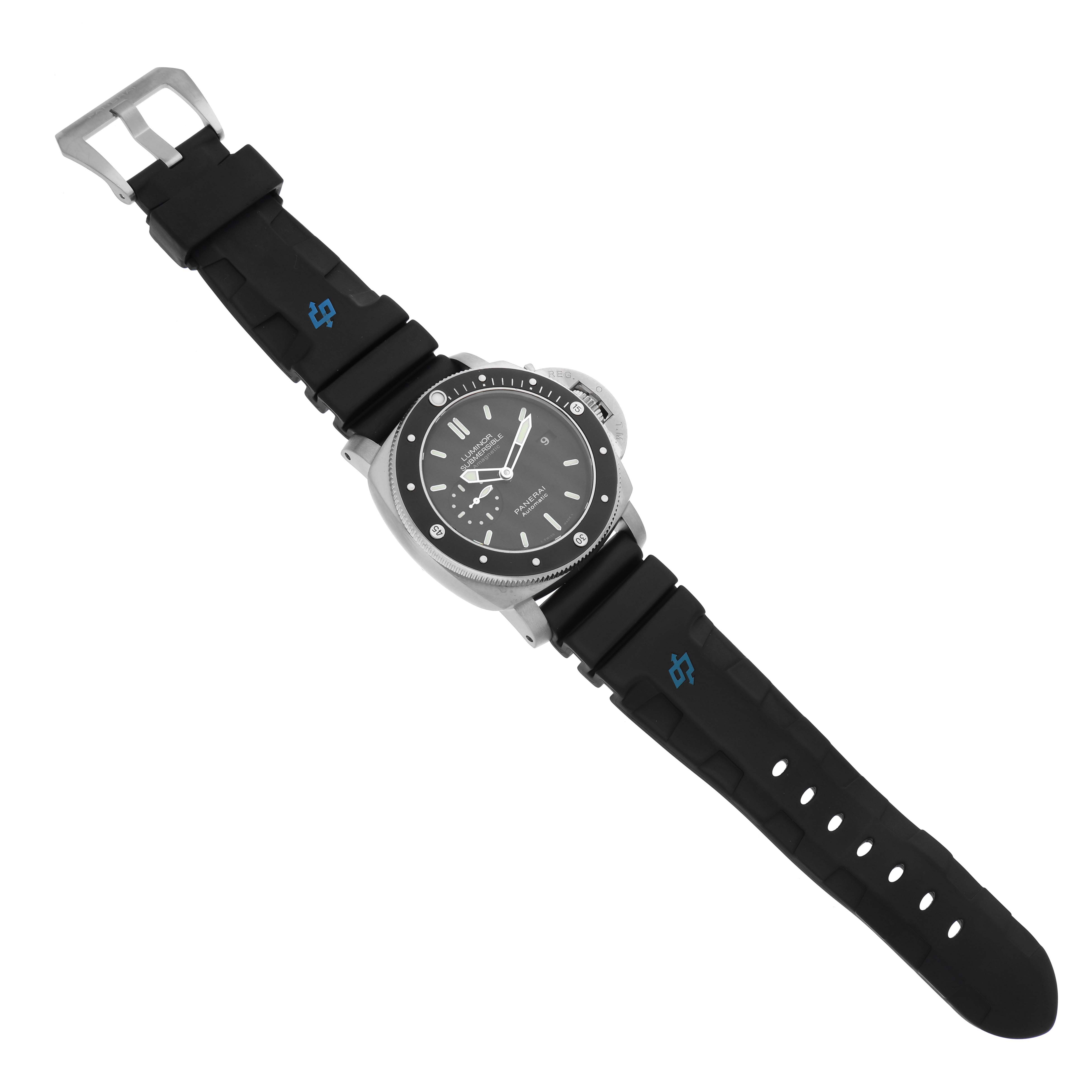 This is a top view of a Panerai Submersible PAM00389 Men's Titanium Black Dial PAM00389 Men's Titanium Black Dial watch showing the face, bezel, case, and black rubber strap with buckle.