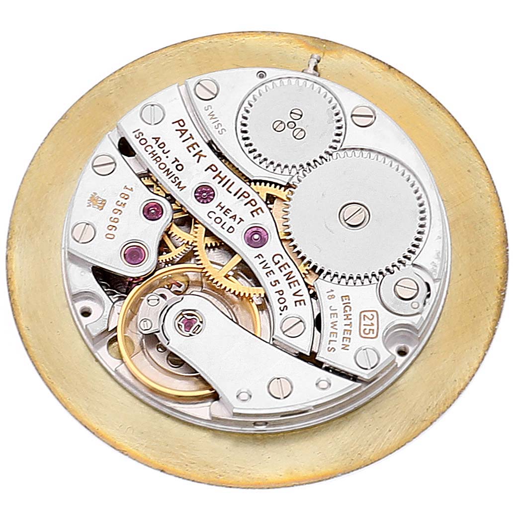 This image shows the intricate internal mechanism of the Calatrava model by Patek Philippe from a top-down angle.