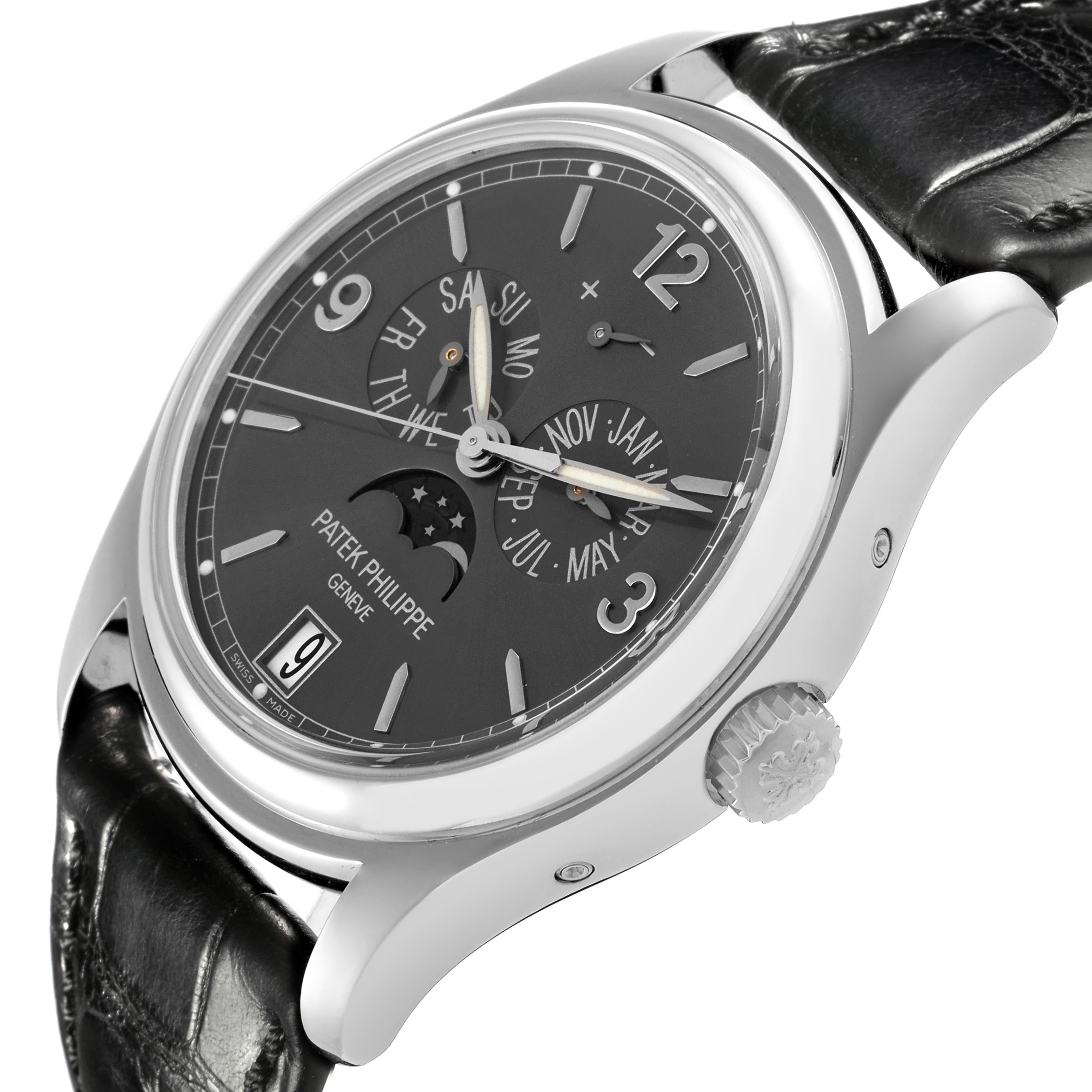 The Patek Philippe Complications 5146G-010 Men's White Gold Grey Dial 5146G-010 Men's White Gold Grey Dial watch is shown at a three-quarter angle, highlighting the face, crown, and leather strap.