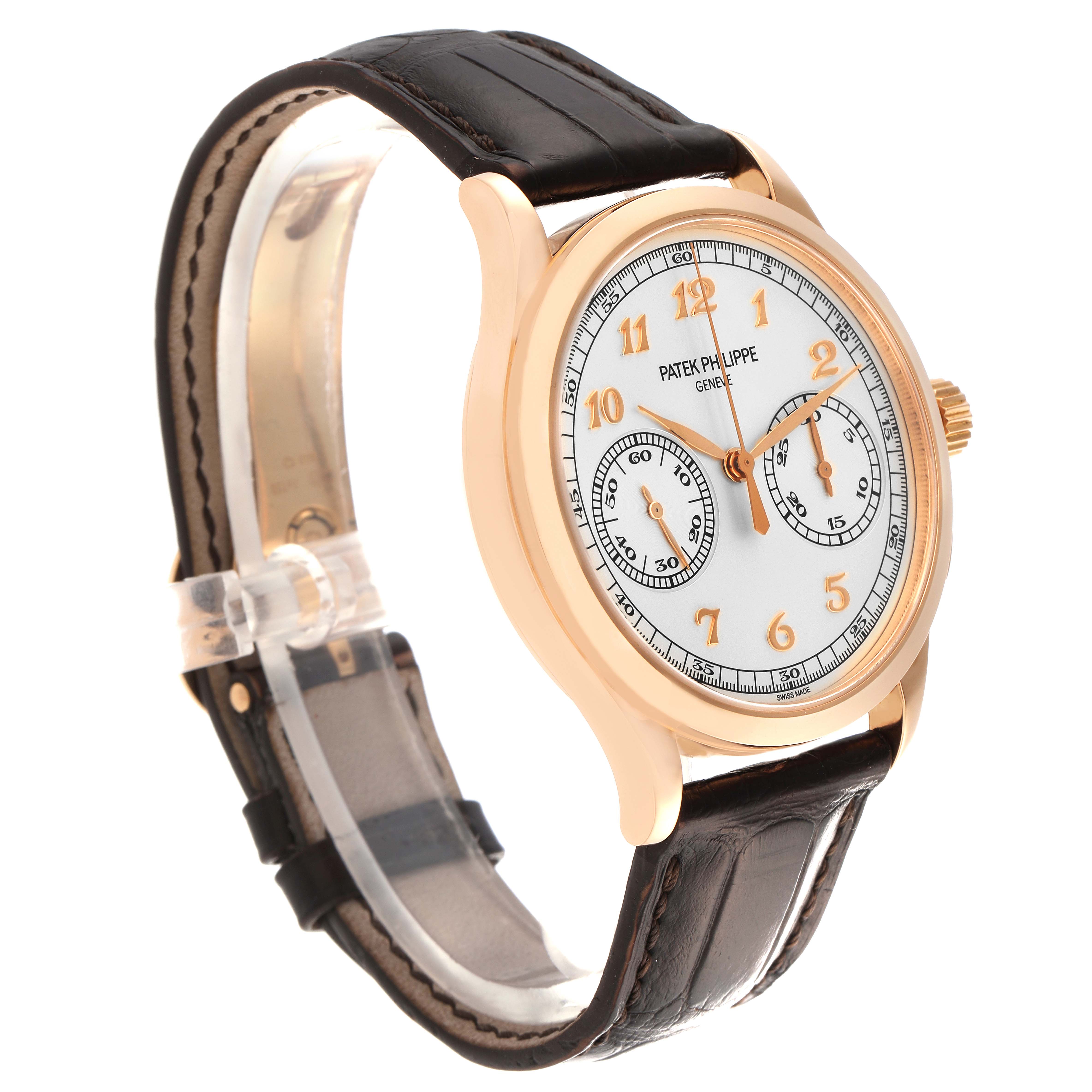 The Patek Philippe Complications 5170R Men's Rose Gold Silver Dial 5170R Men's Rose Gold Silver Dial watch is shown at a slight angle, highlighting the dial, case, crown, and leather strap.