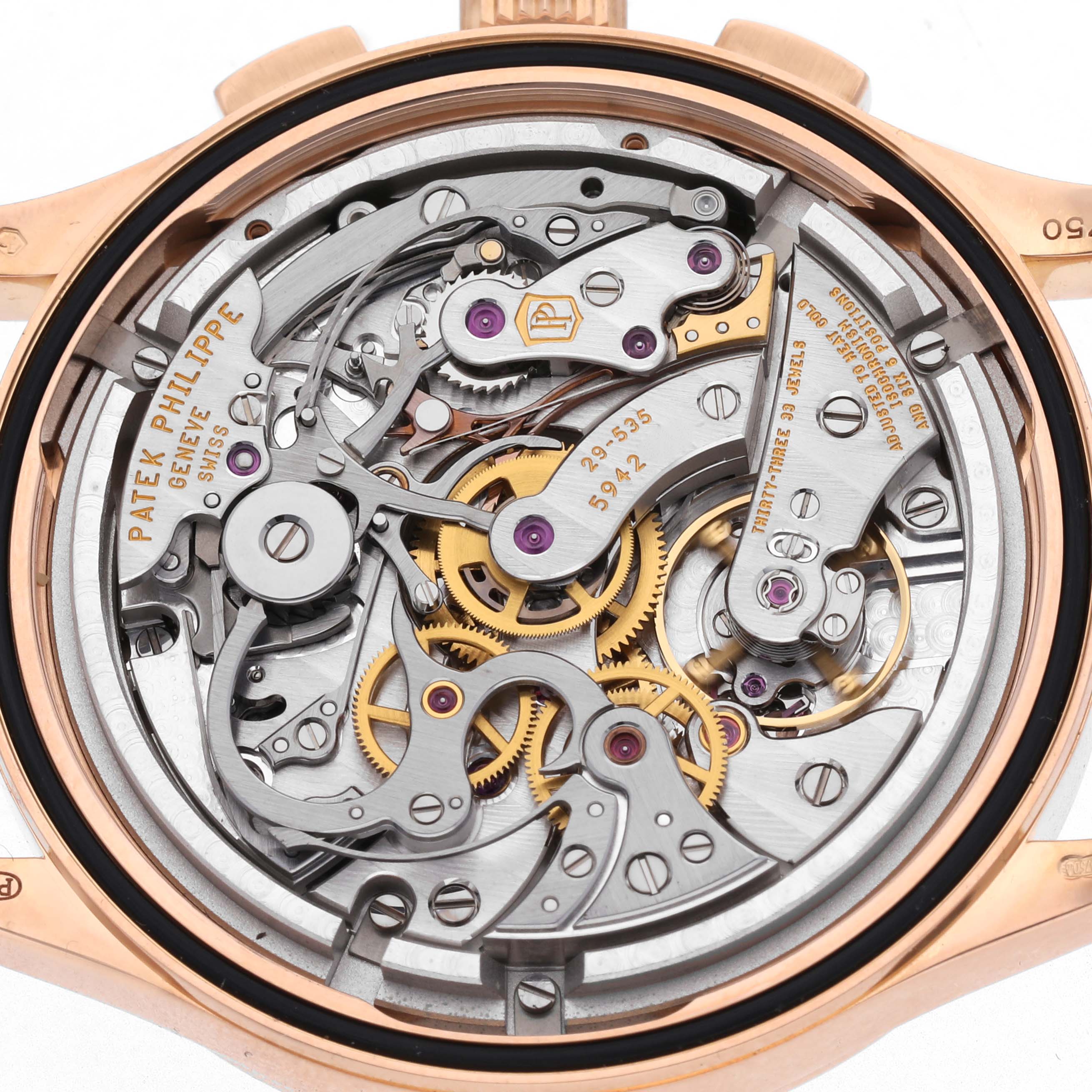 The image shows the intricate mechanical movement of a Patek Philippe Complications 5170R Men's Rose Gold Silver Dial 5170R Men's Rose Gold Silver Dial watch from a back view.