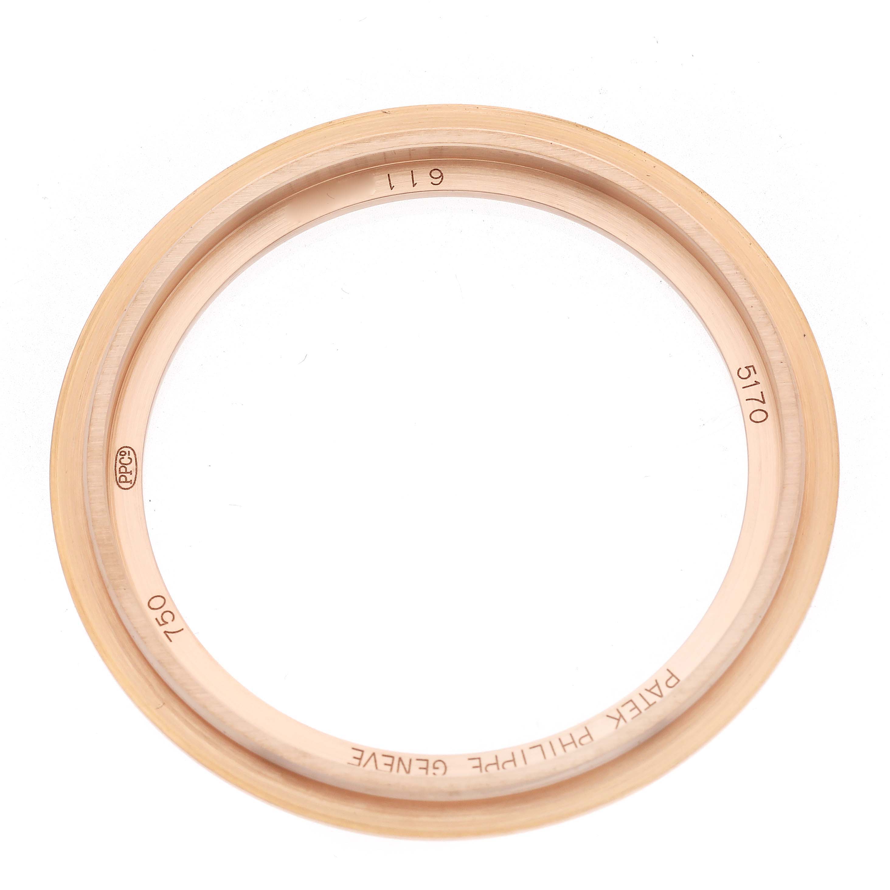 This image shows a top view of a Patek Philippe Complications 5170R Men's Rose Gold Silver Dial 5170R Men's Rose Gold Silver Dial watch bezel, model number 5170.