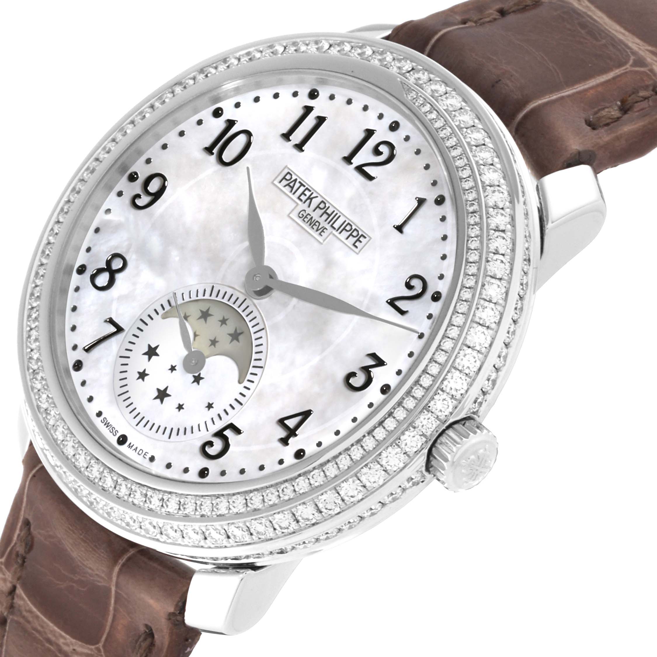 This image shows a Patek Philippe Complications 4968G-010 Women's White Gold Mother of Pearl Dial 4968G-010 Women's White Gold Mother of Pearl Dial model from a side angle, highlighting its case, dial, hands, and leather strap.