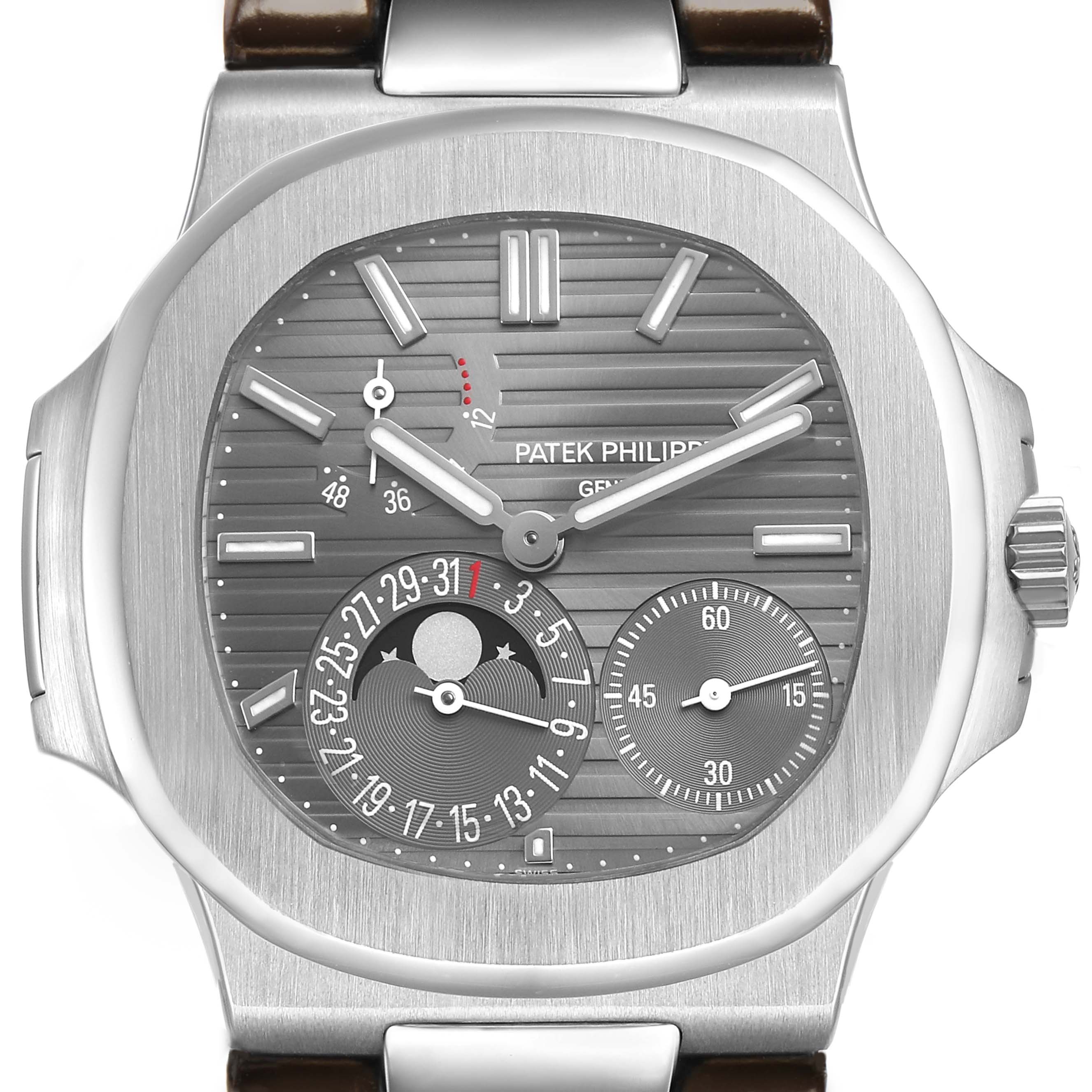 The image shows a front view of the Patek Philippe Nautilus 5712G-001 Men's White Gold Grey Dial watch, highlighting the dial and complications.