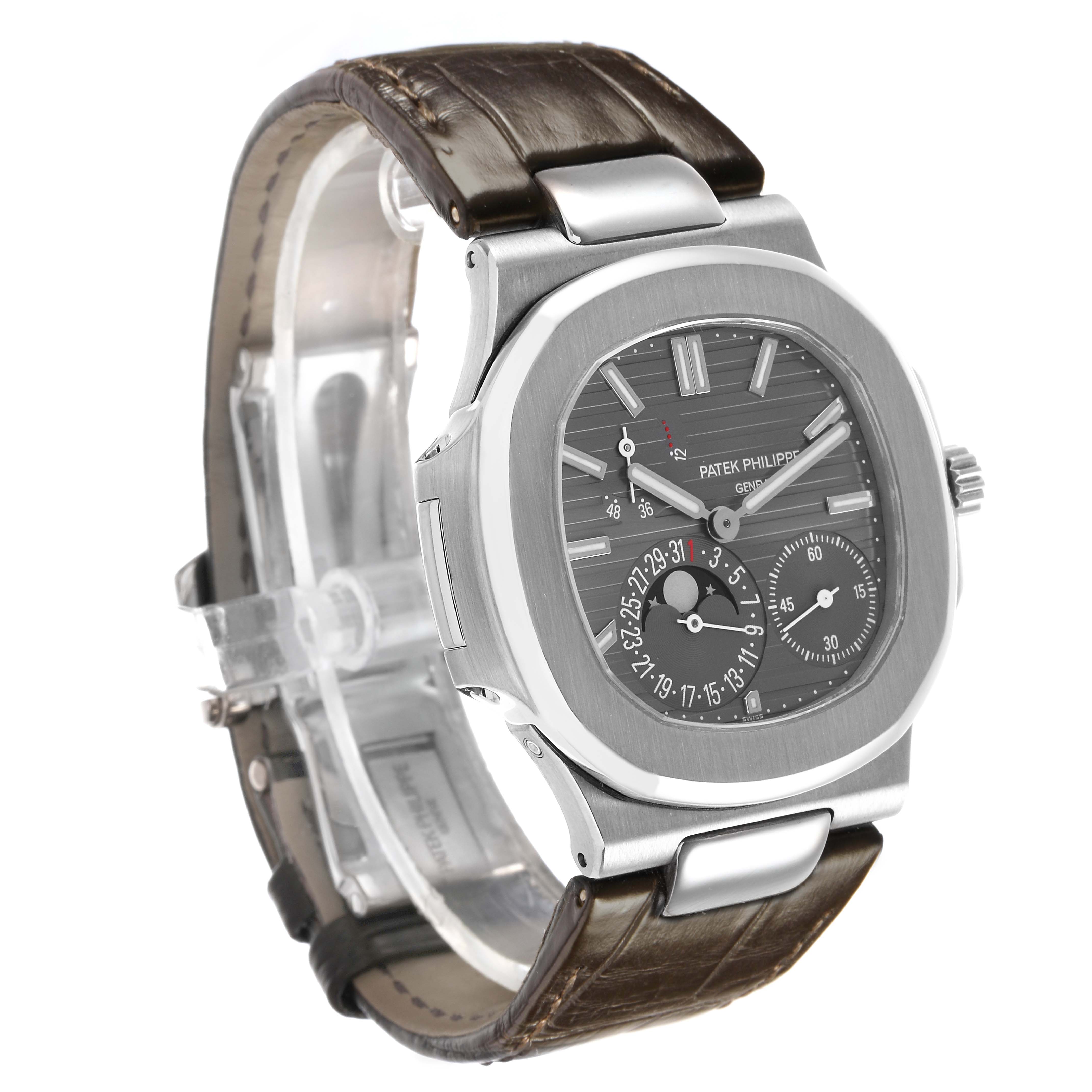 The Patek Philippe Nautilus 5712G-001 Men's White Gold Grey Dial watch is shown at a front-left angle, highlighting the face, dial, and leather strap.