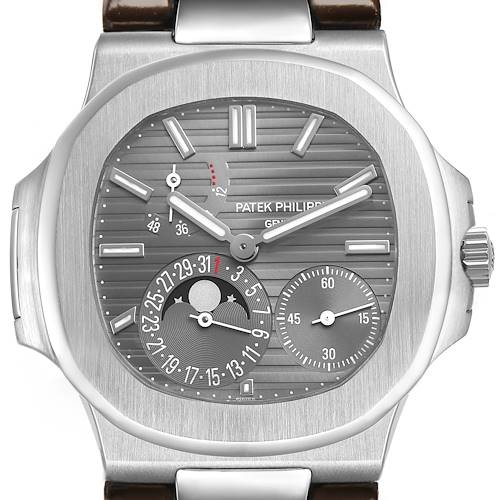 The Patek Philippe Nautilus 5712G-001 Men's White Gold Grey Dial watch is shown from a front angle, highlighting its dial and subdials.