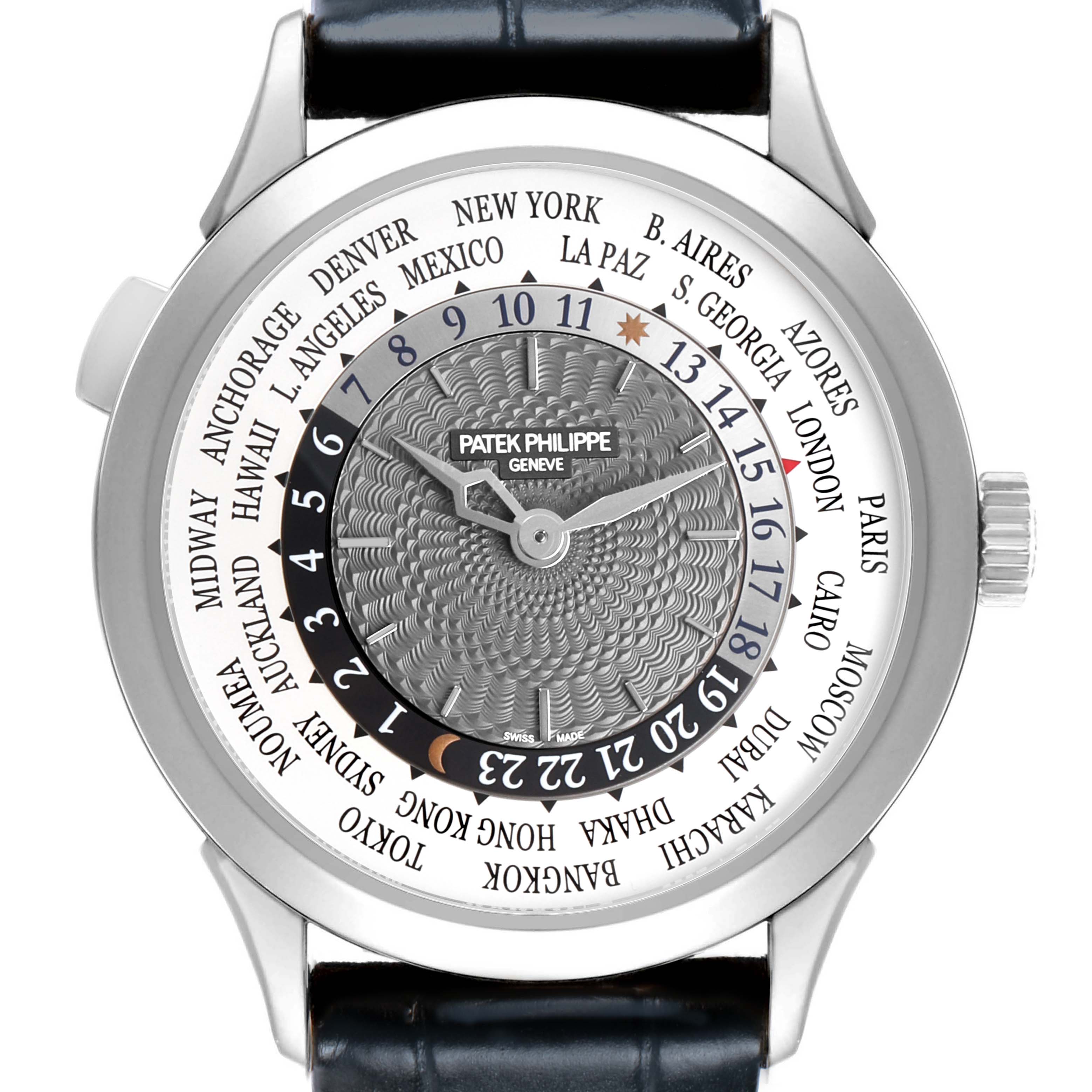 The Patek Philippe Complications 5230G-001 Men's White Gold Grey Dial watch is shown from a top view, highlighting the world time dial and city ring.