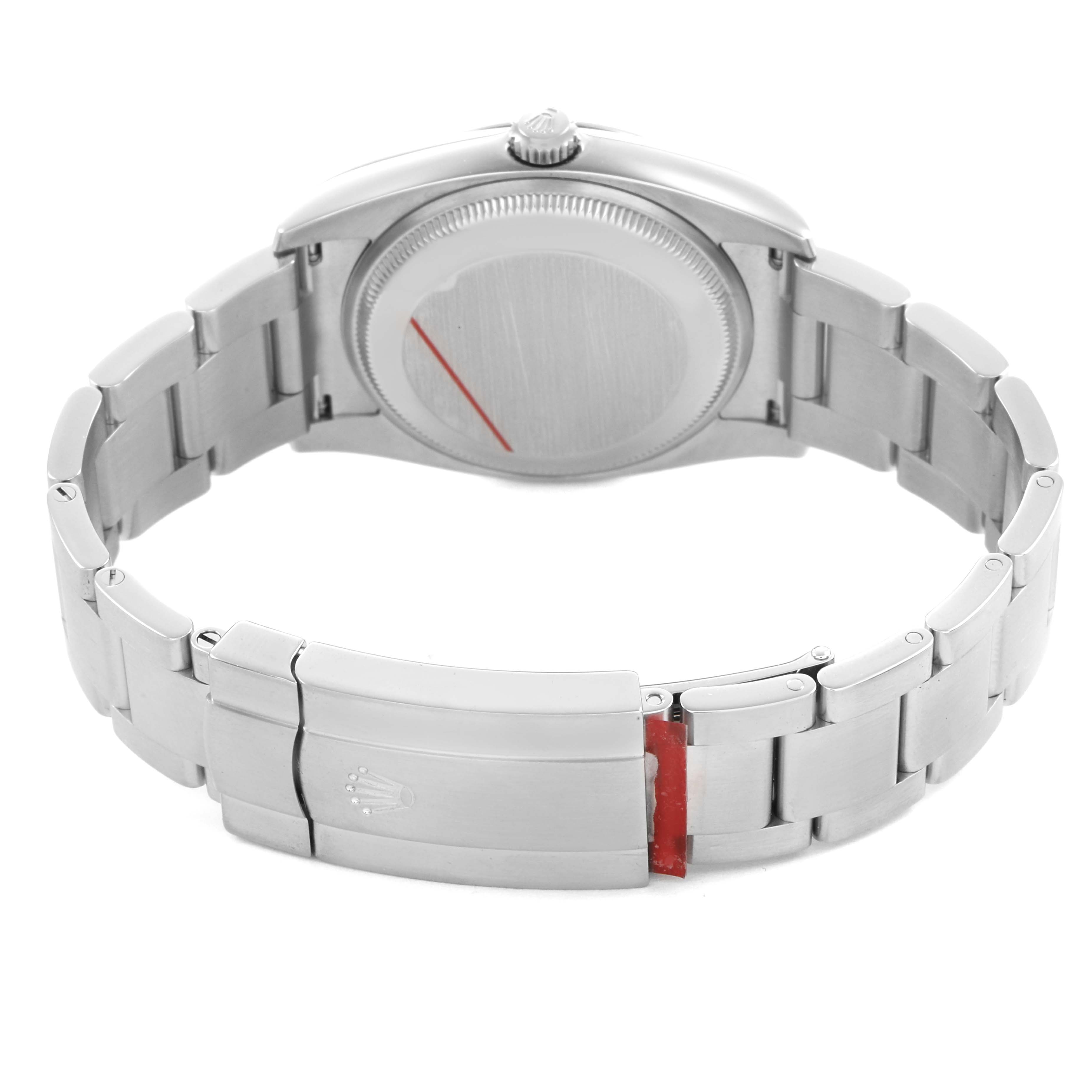 The image shows the back view of a Rolex Oyster Perpetual 114200 Men's Stainless Steel Blue Dial watch, highlighting the stainless steel bracelet and clasp.