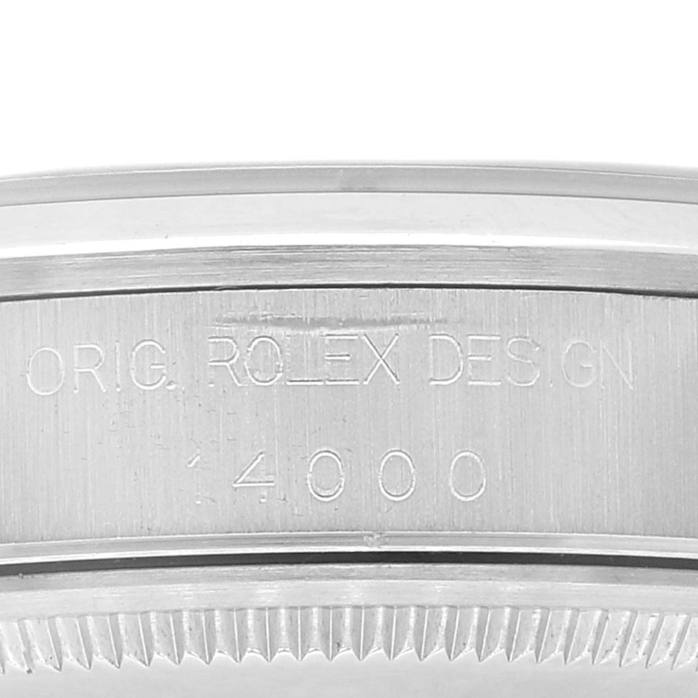 The image shows a close-up of the case side engraving for the Rolex Air-King 14000 Men's Stainless Steel Black Dial 14000 Men's Stainless Steel Black Dial model.