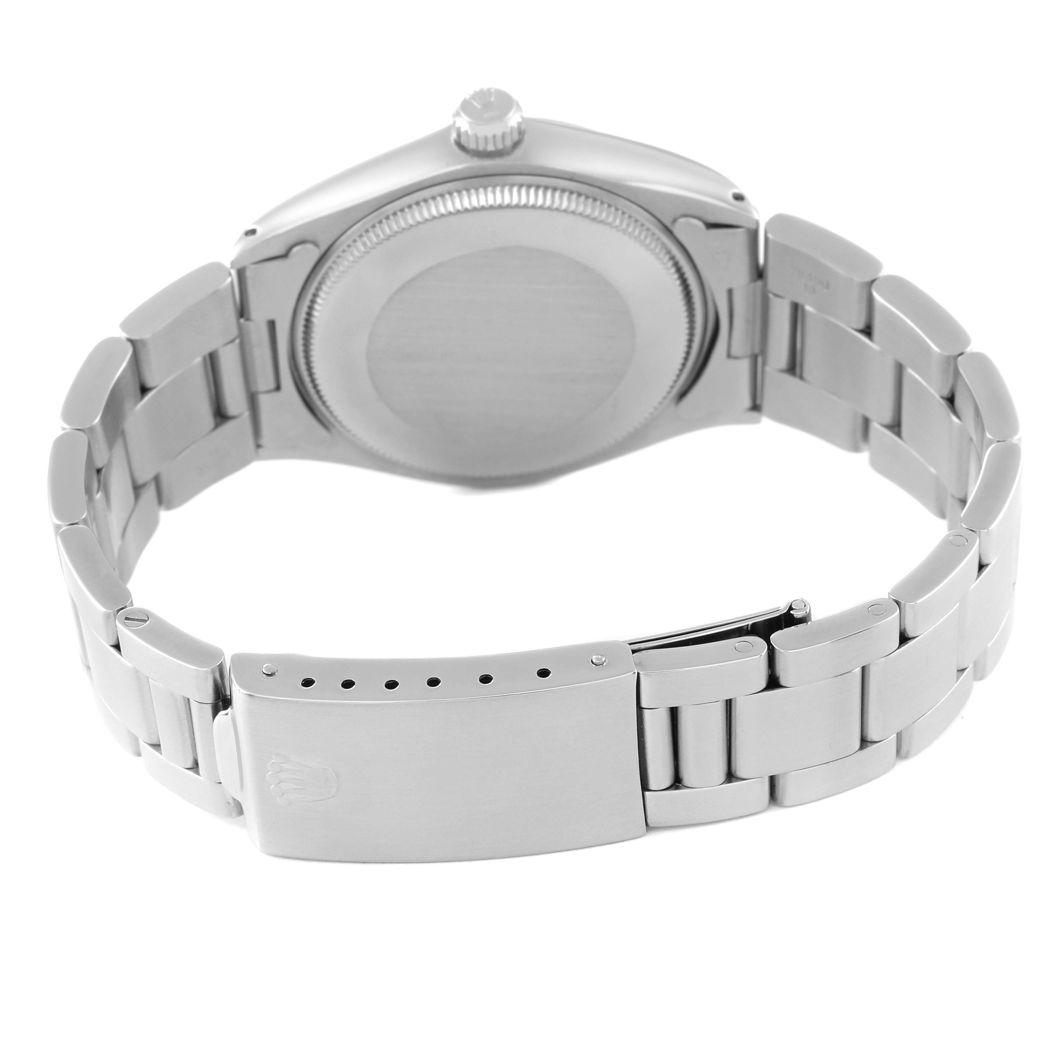 This image shows the back and clasp of the Rolex Air-King 5500 Men's Stainless Steel Silver Dial 5500 Men's Stainless Steel Silver Dial watch, highlighting its metal bracelet design.