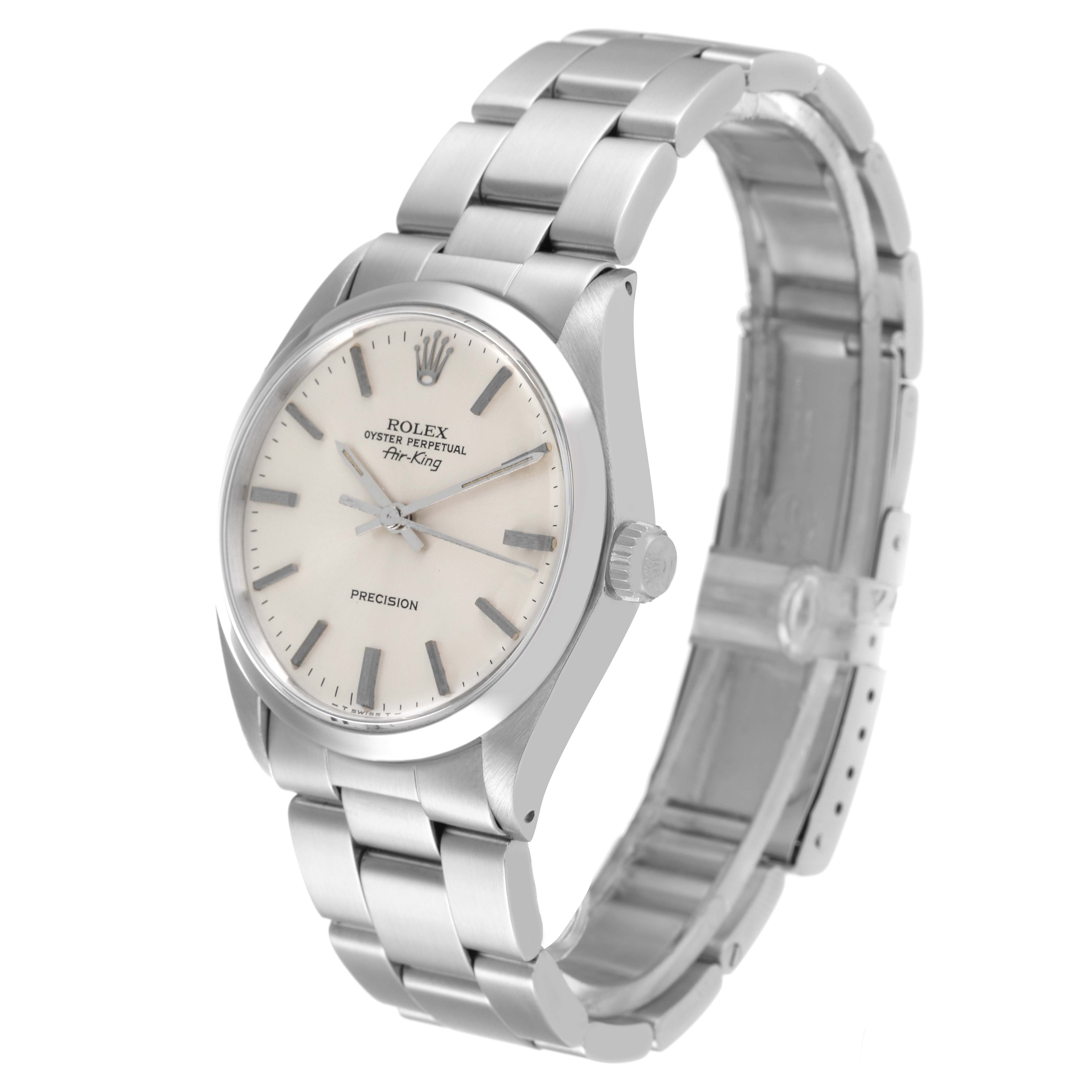 This Rolex Air-King 5500 Men's Stainless Steel Silver Dial 5500 Men's Stainless Steel Silver Dial watch is shown at an angle displaying the face, bezel, crown, and part of the bracelet.