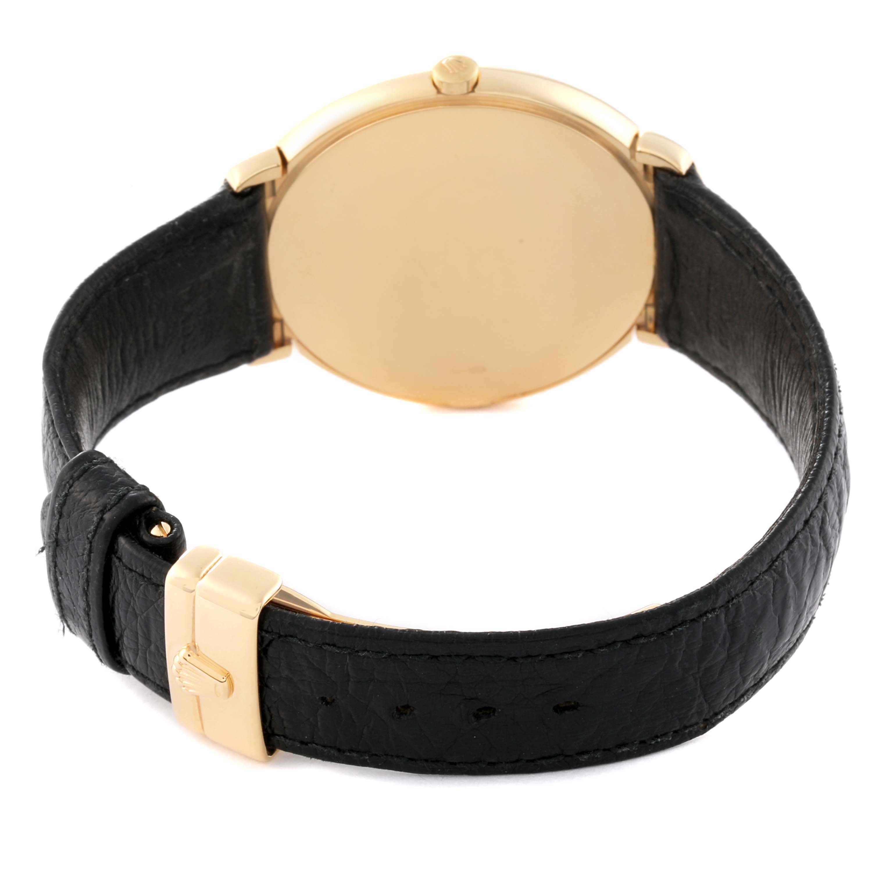 The image shows the back of a Rolex Cellini 6623 Men's Yellow Gold White Dial 6623 Men's Yellow Gold White Dial watch, highlighting the gold casing and the black leather strap with a gold buckle.