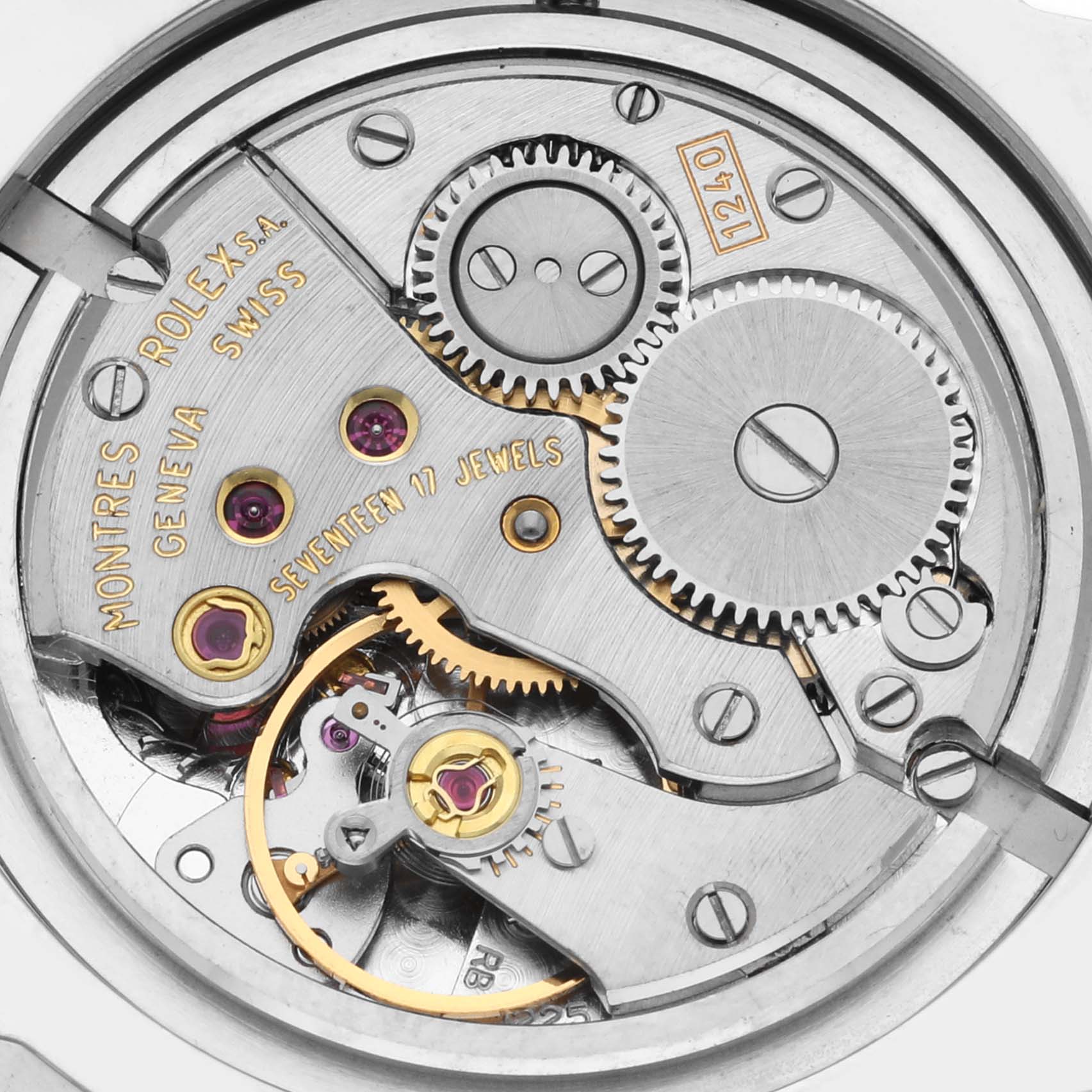 The image shows a detailed view of the Rolex Cellini 5240 Men's Platinum Mother of Pearl Dial 5240 Men's Platinum Mother of Pearl Dial watch movement and internal gears from a top-down angle.