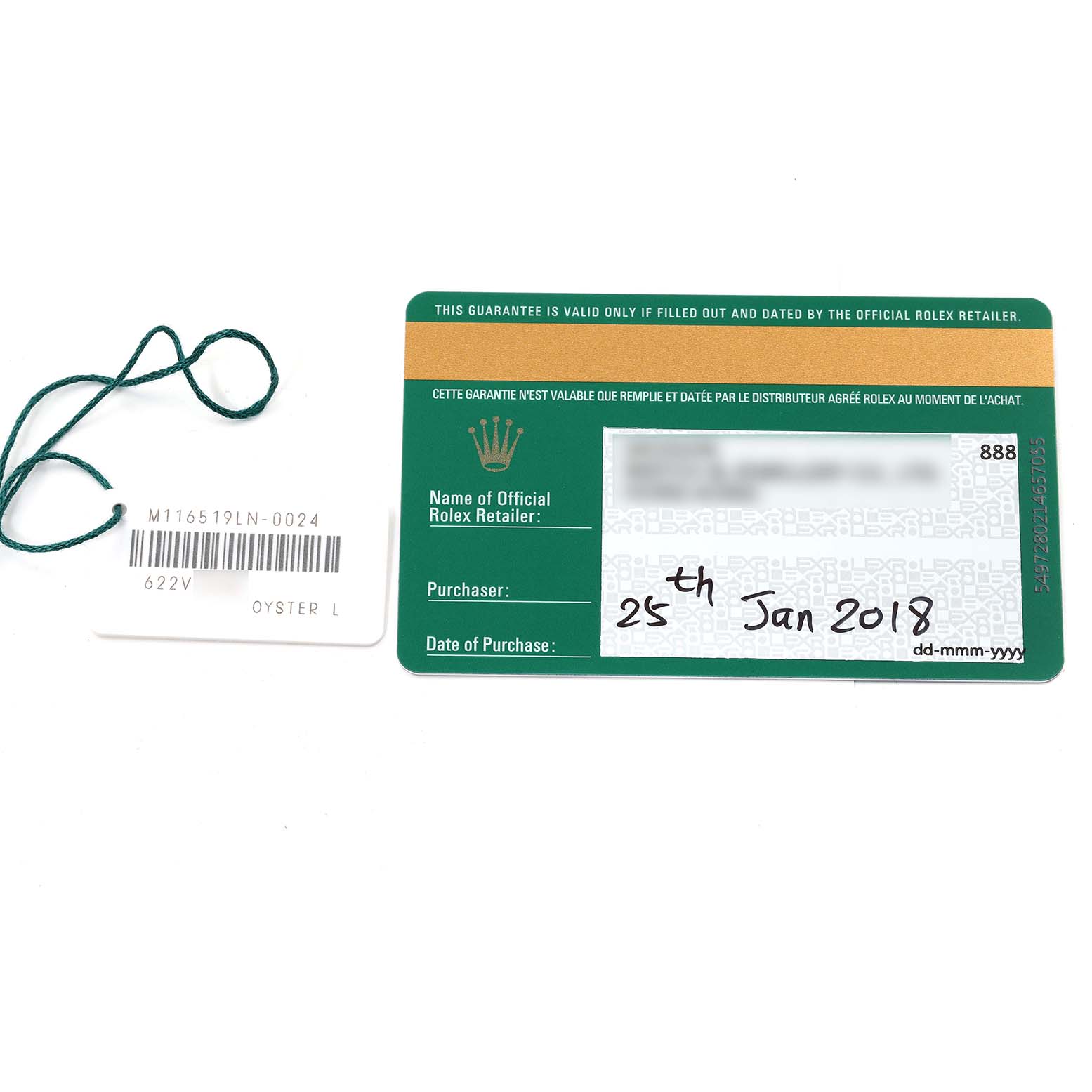 The image shows a guarantee card and a tag for a Rolex Daytona 116519 Men's White Gold Grey Dial 116519 Men's White Gold Grey Dial watch model M116519LN-0024.