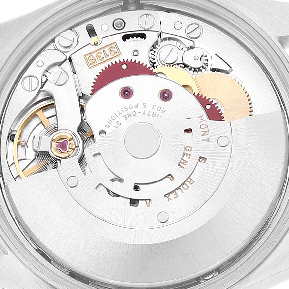 This image shows the intricate internal mechanism of a Rolex Date 15210 Men's Stainless Steel White Dial 15210 Men's Stainless Steel White Dial model watch from a back angle.