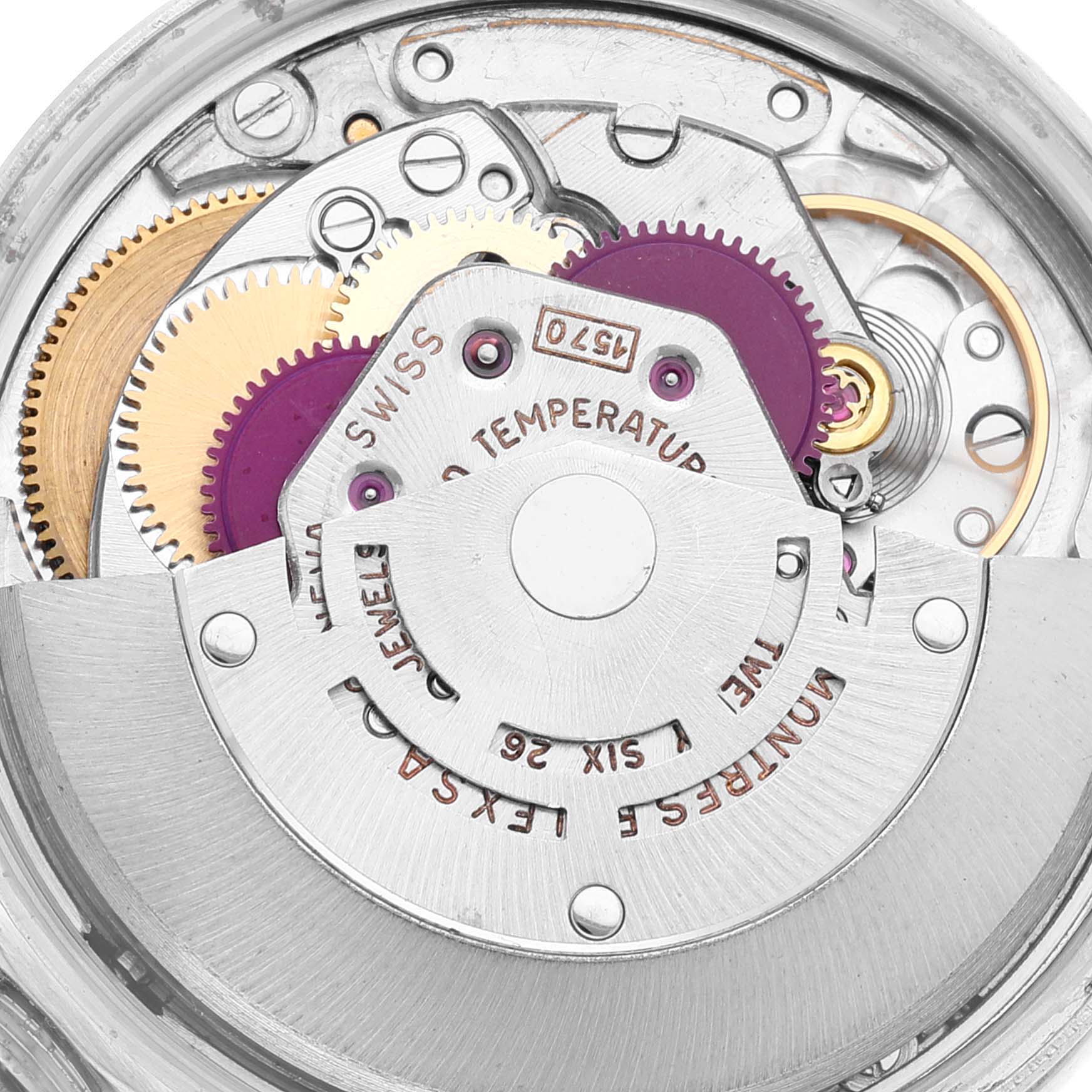 This image shows the intricate mechanical movement of a Rolex Vintage Collection 1501 Men's Stainless Steel White Dial 1501 Men's Stainless Steel White Dial watch.