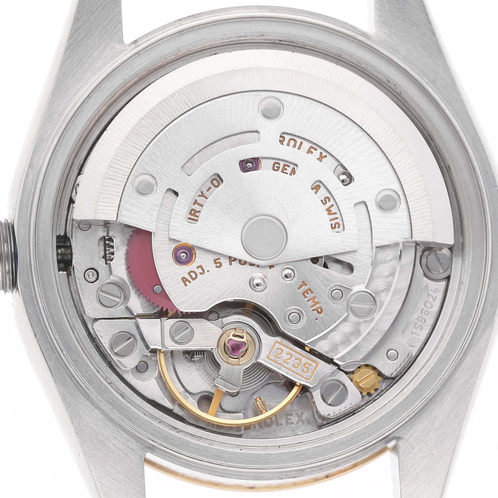 The image shows the movement of a Rolex Datejust 79173 Women's Steel and Gold (two tone) Silver Dial watch from a rear angle, highlighting the mechanism details.