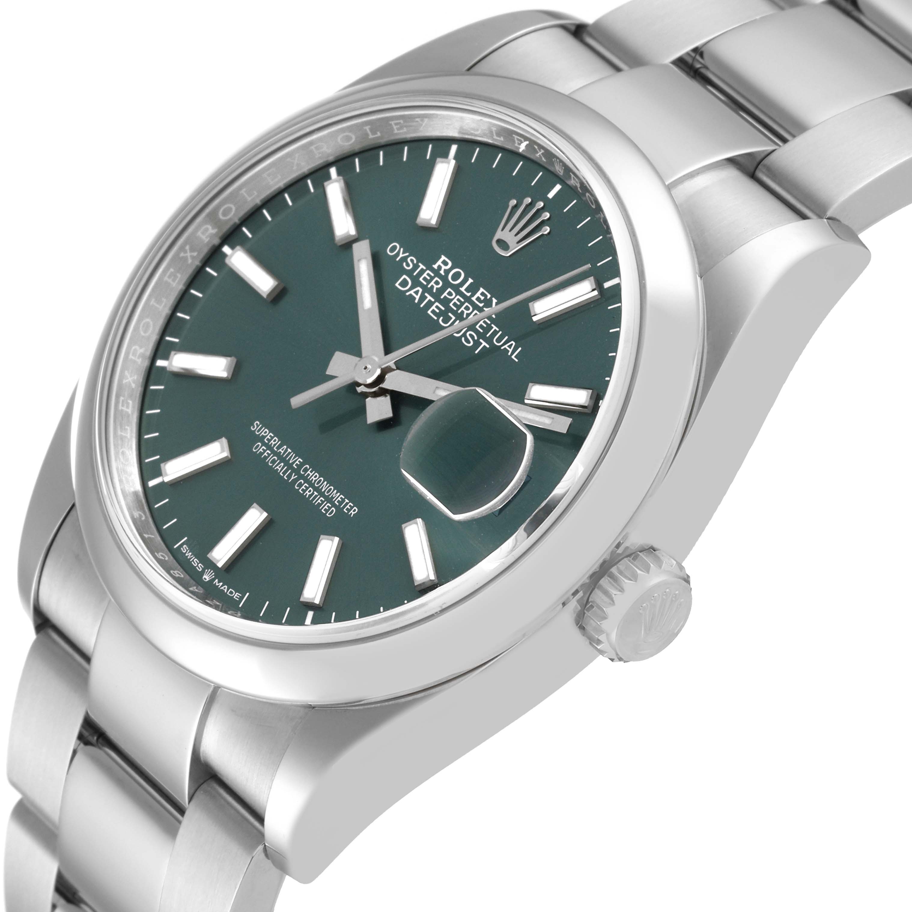 This Rolex Datejust 126200 Men's Stainless Steel Green Dial 126200 Men's Stainless Steel Green Dial is shown from a slightly tilted angle, highlighting the dial, bezel, crown, and part of the bracelet.