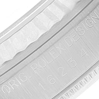 This is a close-up of the Rolex Datejust 16234 Men's Stainless Steel Blue Dial 16234 Men's Stainless Steel Blue Dial model showing the inner rim of the watch case with engraved text.