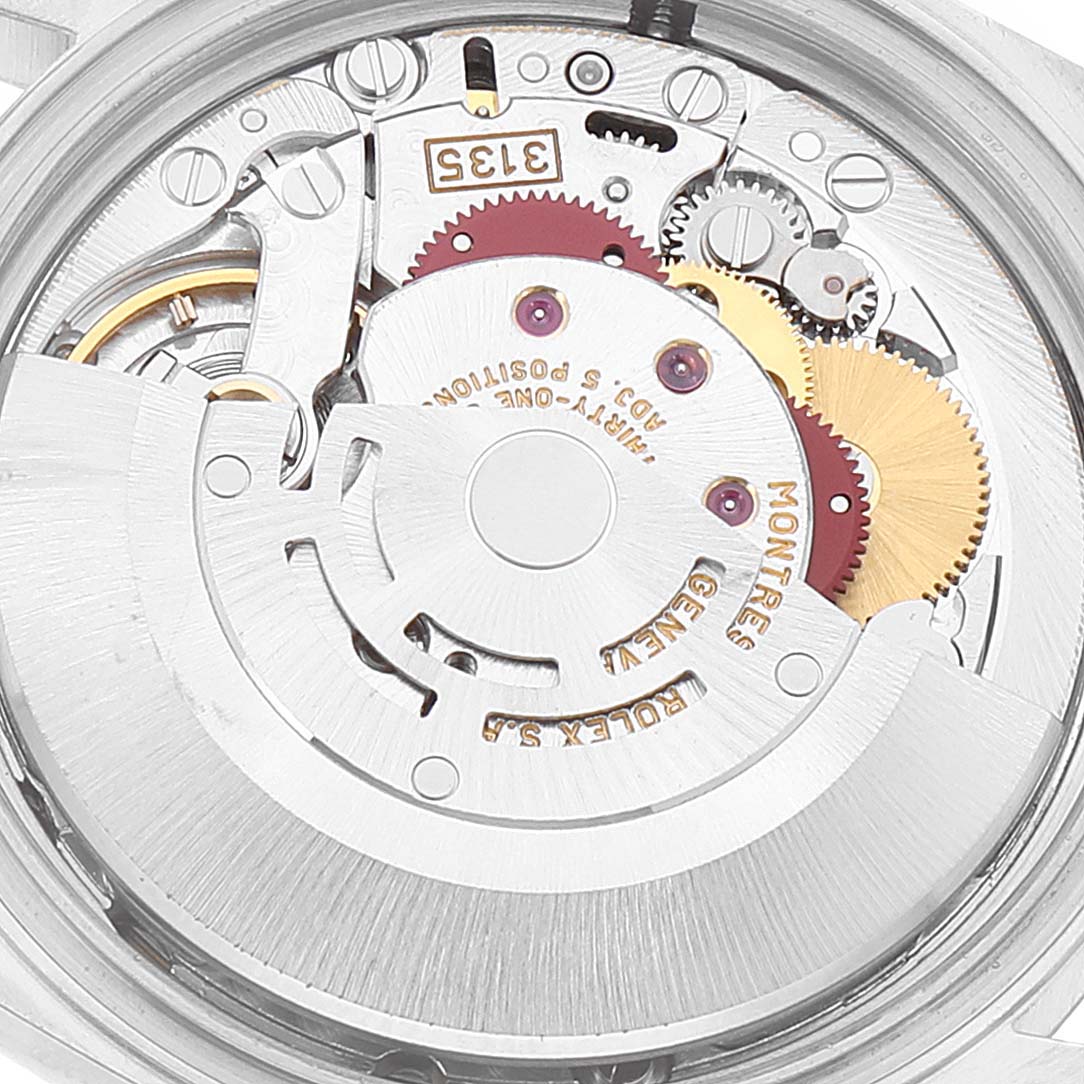 This is a close-up shot of the movement mechanism inside a Rolex Datejust 16234 Men's Stainless Steel Blue Dial 16234 Men's Stainless Steel Blue Dial watch.