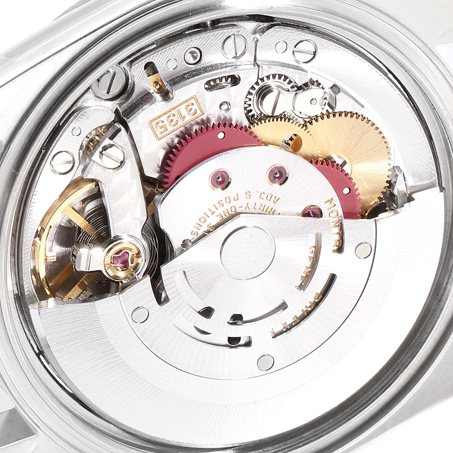 The image shows the intricate inner mechanics of a Rolex Datejust 16234 Men's Stainless Steel White Dial 16234 Men's Stainless Steel White Dial watch from a close-up angle, highlighting its gears and movement.