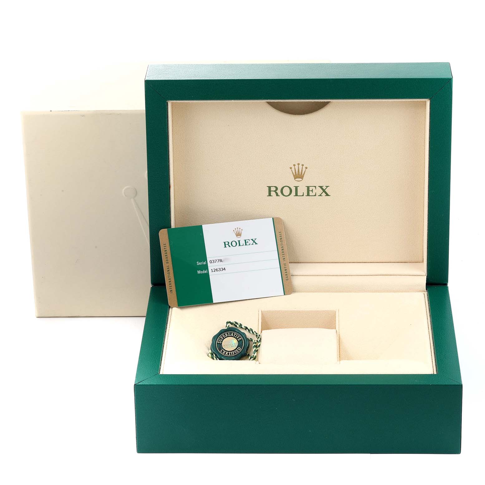 This image shows the open box of a Rolex Datejust 41 126334 Men's Stainless Steel Silver Dial 126334 Men's Stainless Steel Silver Dial model, including the warranty card and tag.