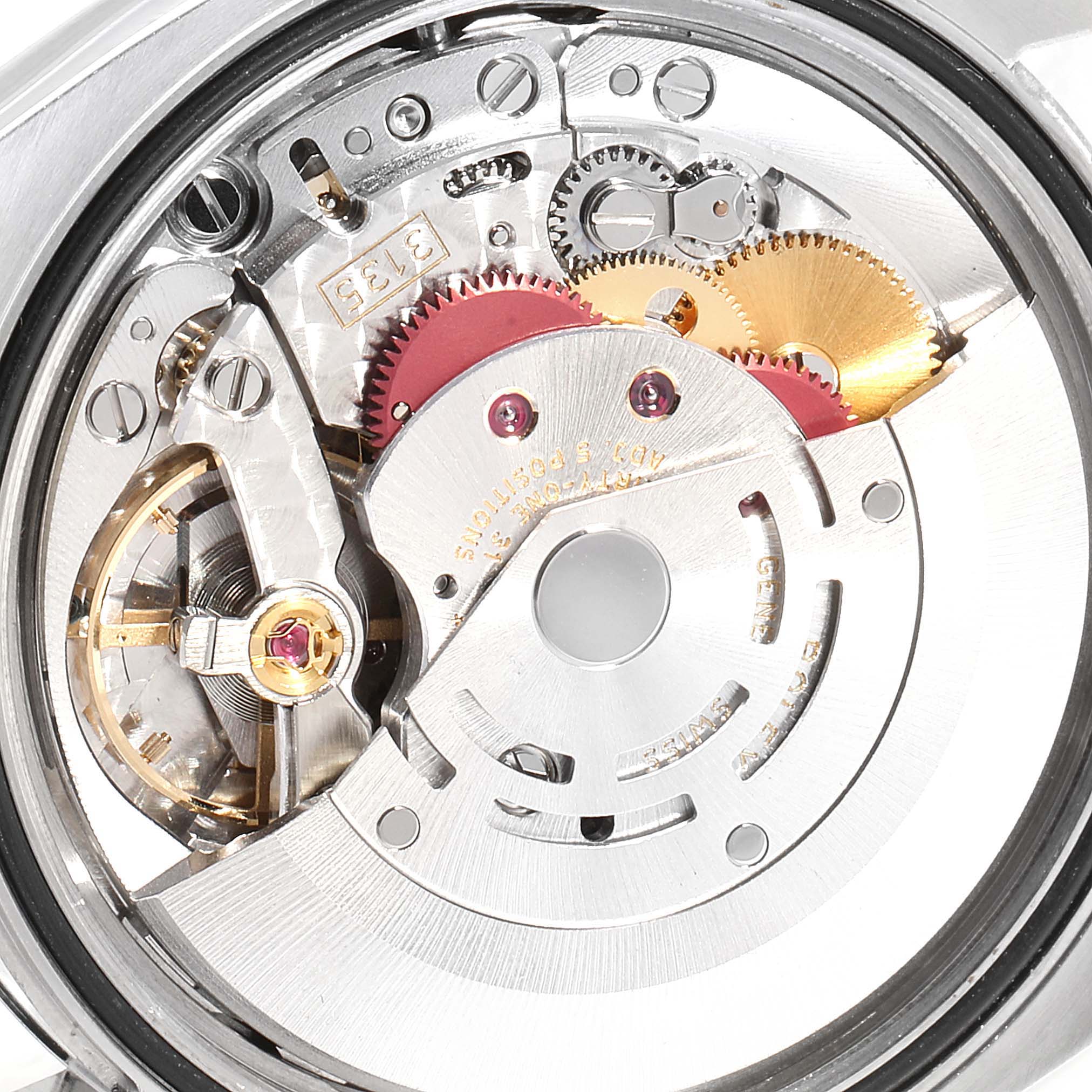 This image shows a close-up view of the movement and internal components of a Rolex Datejust 116200  Men's Stainless Steel Black Dial 116200  Men's Stainless Steel Black Dial watch.